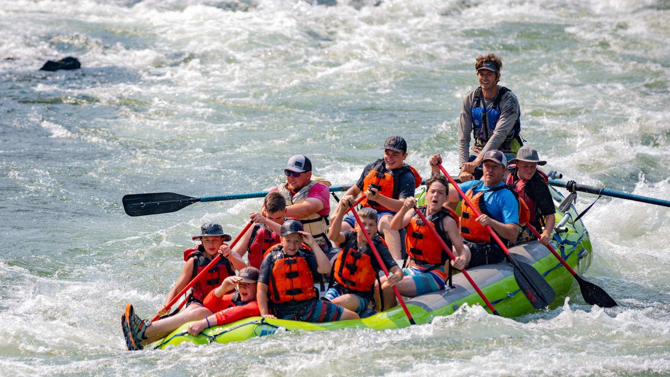University of Idaho alumni and friends gather to go rafting in Riggins, Idaho.