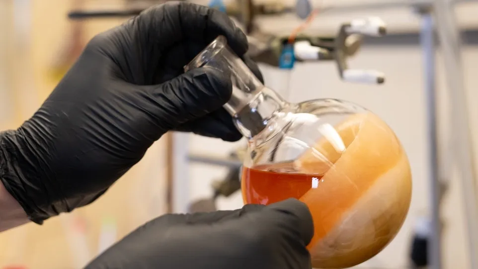 Synthetic organometallic chemist, University of Idaho Chemistry professor Richard Thompson, uses metals to manipulate other organic molecules researching ways to find safer and more energy efficient avenues for making the same chemicals that we already have and in the process discover new and better materials. Pictured working with lab materials. Pictured working with a fume hood.