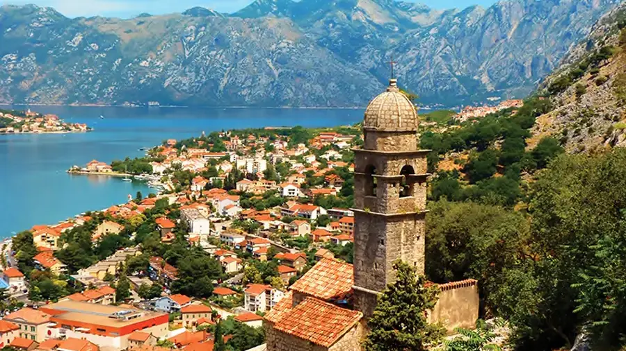 The historical coastal city Kotor surrounded by mountains and the sea.
