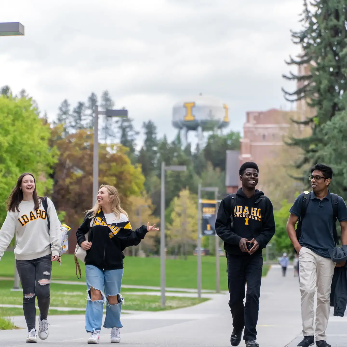 Students walk together down the Academic Mall on Monday, May 5, 2025.