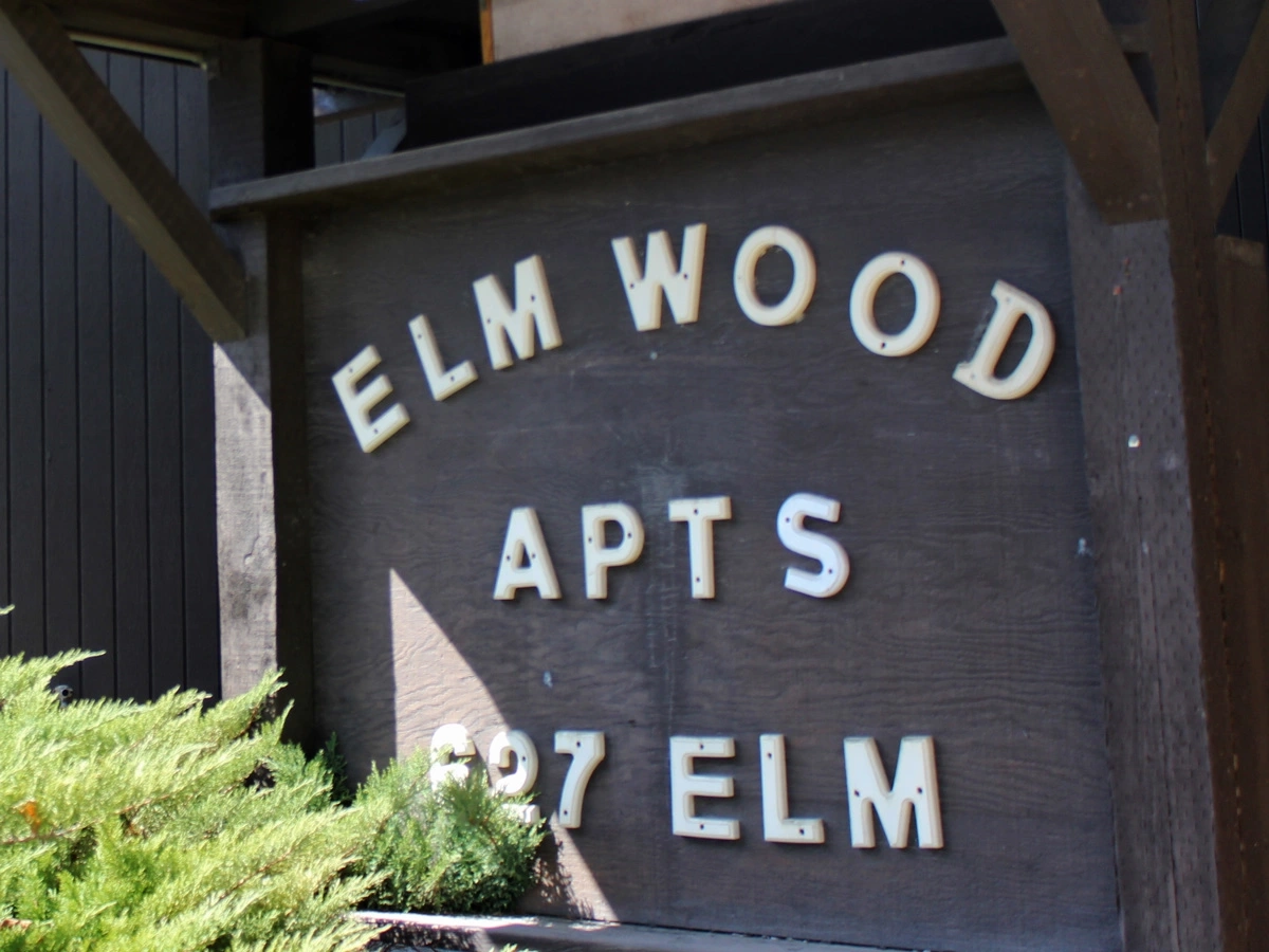 Elmwood apartments sign