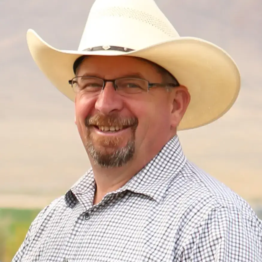 Portrait of David Callister in a white cowboy hat