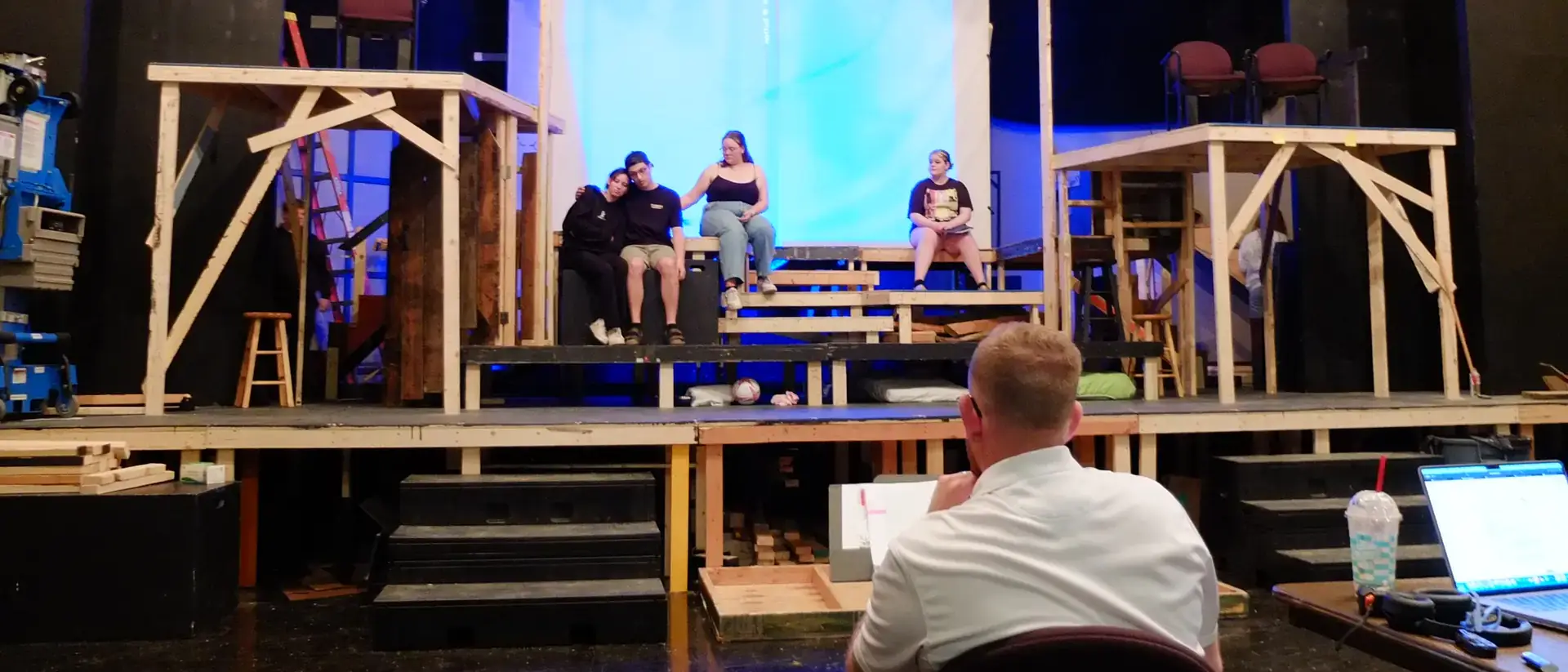 Blake Tobey sitting at a rehearsal