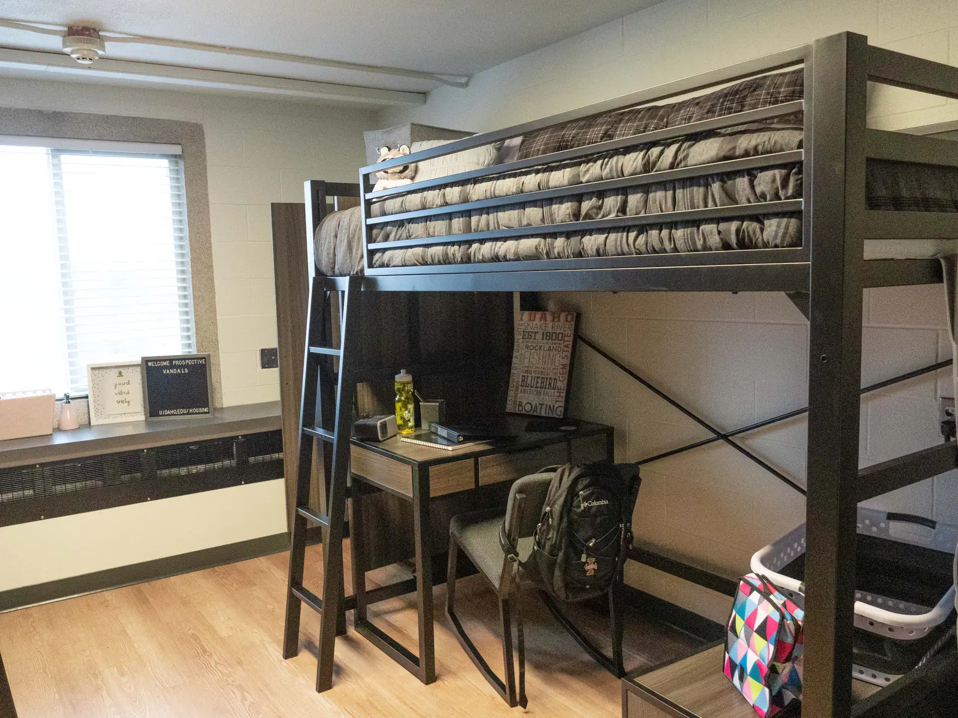 The renovated tower room, showing a loft bed with room under it for a desk.