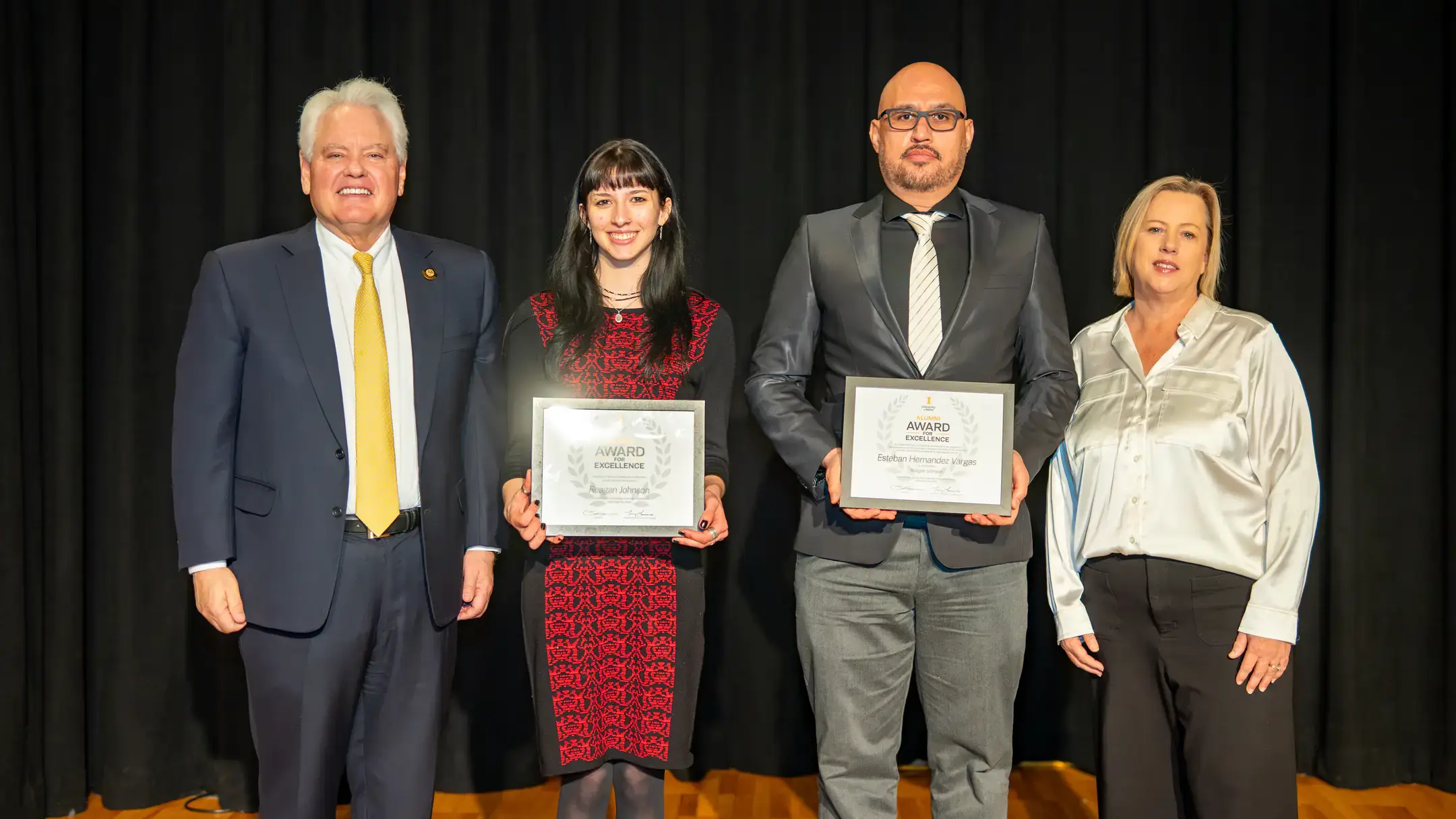 Alumni Awards for Excellence Dinner on Tuesday, November 8, 2025 in the International Ballroom at the Pitman Center. Pictured from left are: UI president Scott Green; student Reagan Johnson; Esteban Hernandez-Vargas, associate professor of mathematics; Sandy Larsen, director of alumni engagement.