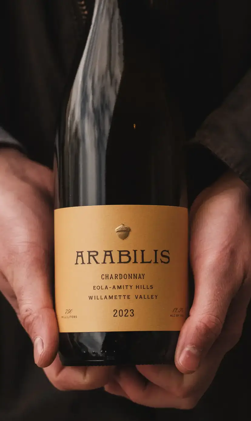 A person holding a wine bottle.