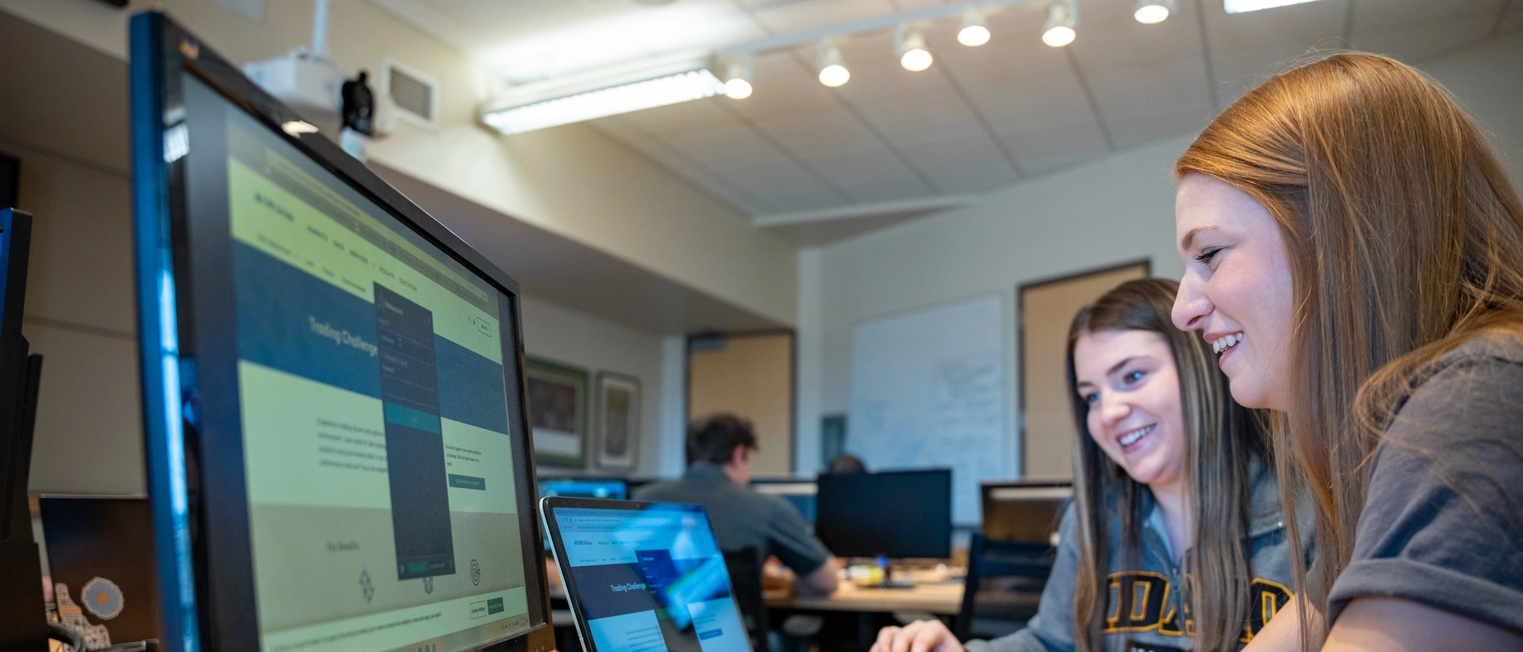 Stock photos and b-roll of AERS students in the Barker Trading Room to use for future marketing efforts.