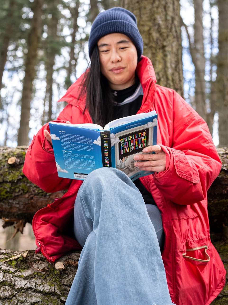 Jennifer Yu, a M.F.A. Creative Writing student, is photographed at the Shattuck Arboretum on March 18, 2025. Yu is the author of three novels, including “Grief in the Fourth Dimension”.