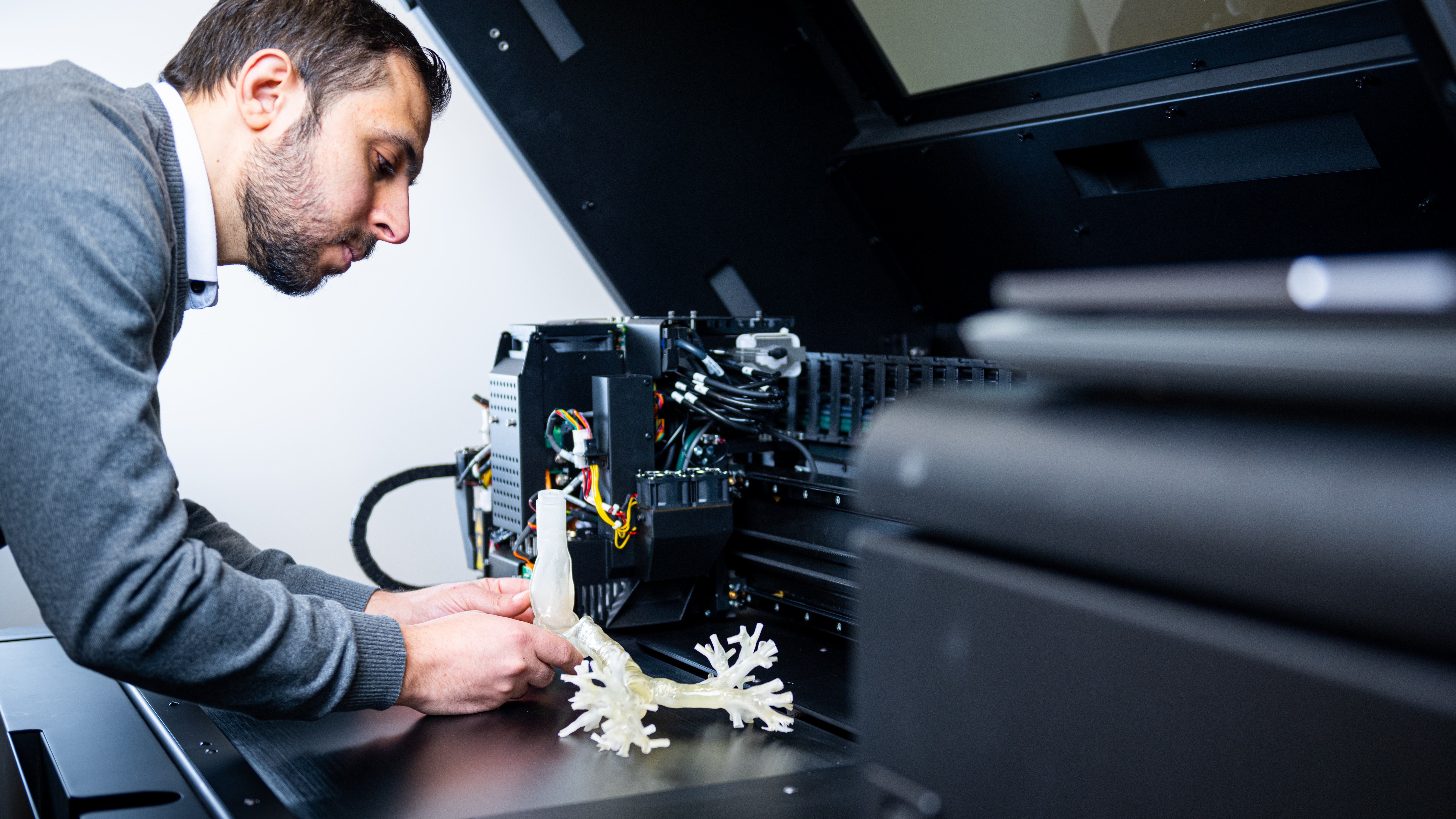 University of Idaho ENGR's Ph.D. student Anas Nawafleh examining 3-D printed lung model.