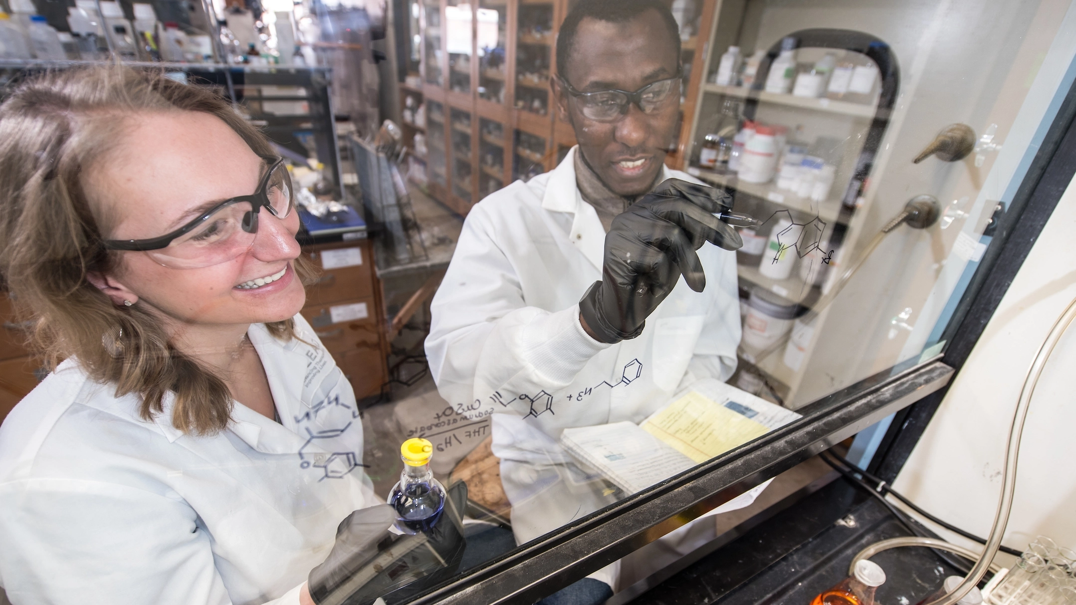 Alyssa Ertyl working in chemistry lab for commencement feature