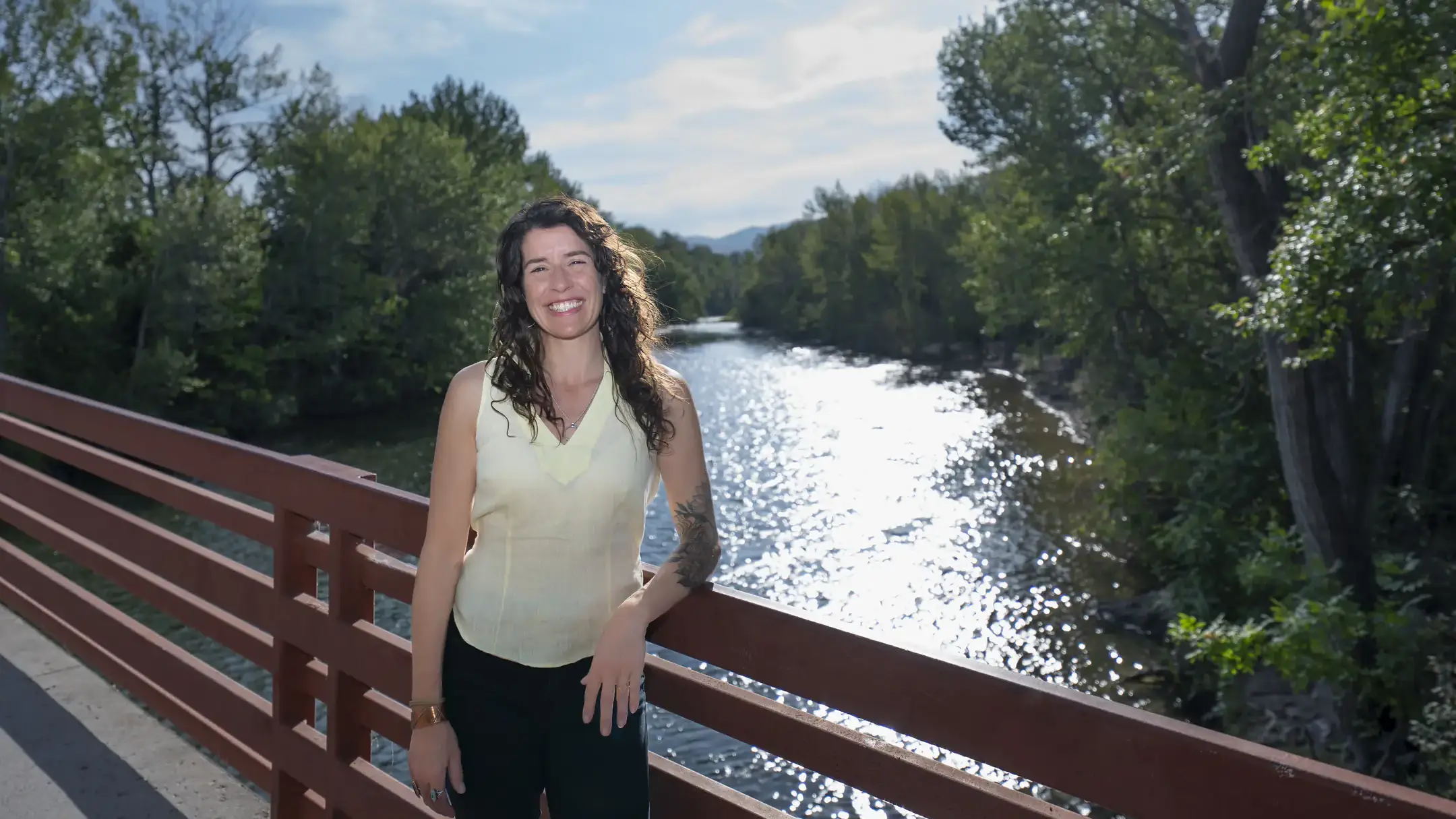 Kendra Kaiser in front of a river.