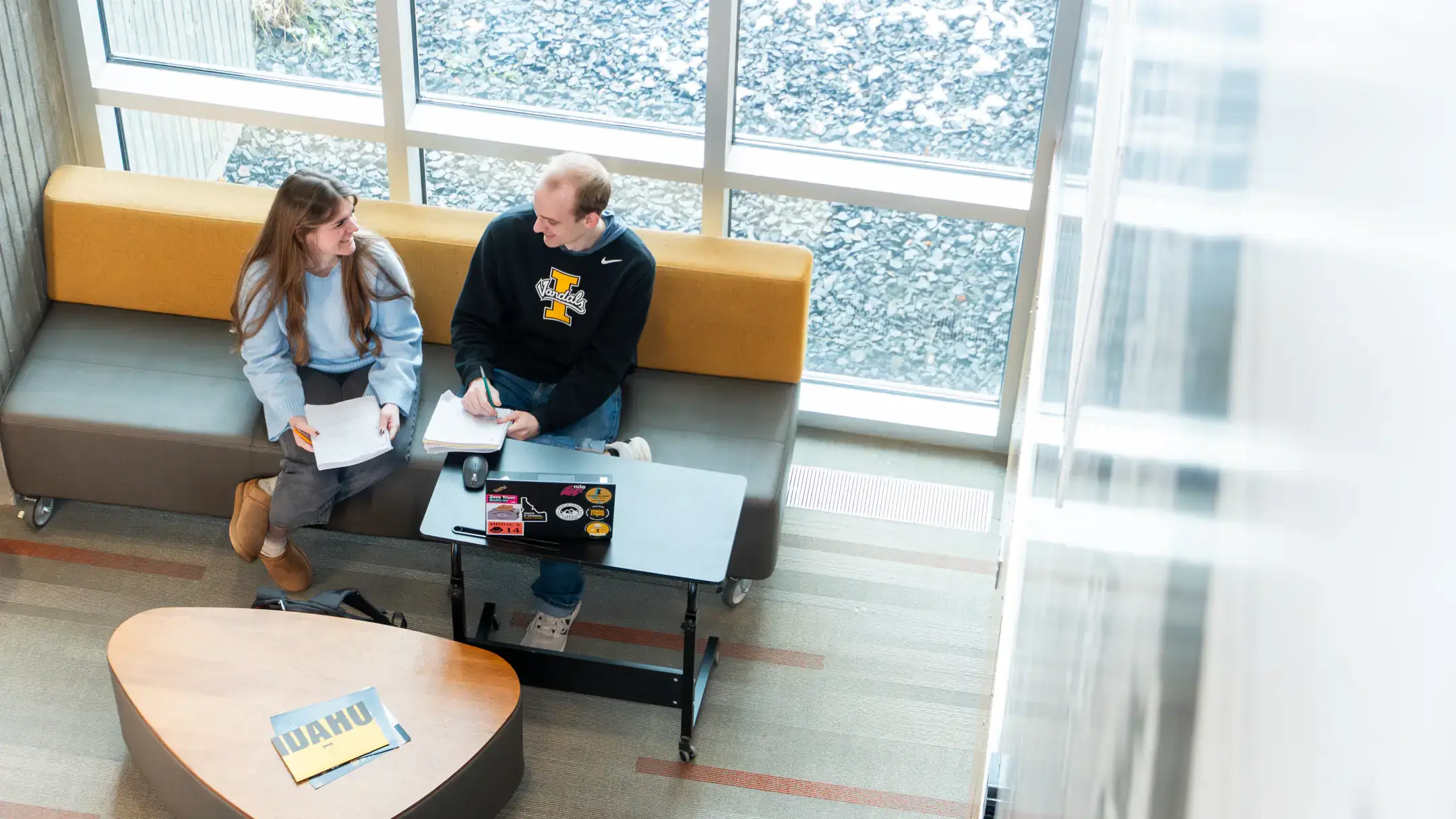 Students Michael Habermann and Jasmine Martinez are pictured at the University of Idaho Coeur d’Alene Harbor Center on Tuesday, December 2, 2025. The two are among dozens of students who benefit each year from a long-standing collaboration between North Idaho College and University of Idaho, which helps students complete prerequisites at NIC before transitioning to U of I to finish their bachelor’s degrees.
