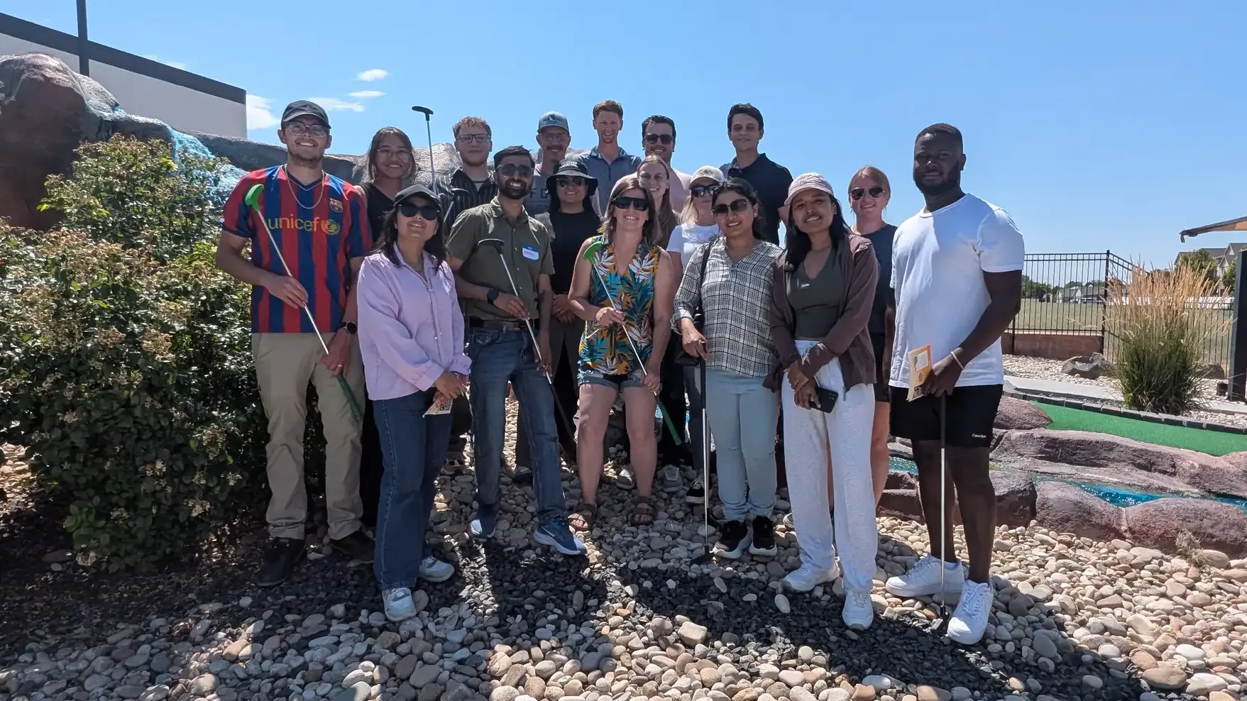 Folks working at a food pantry and two people in front of a combine