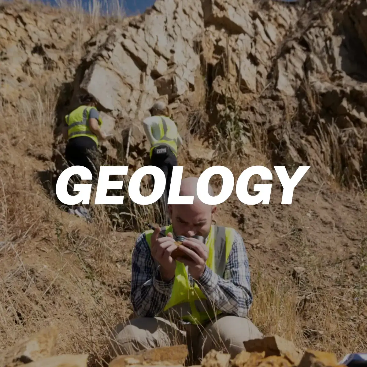 Man studying rock formation with the word "Geology" in bold above him