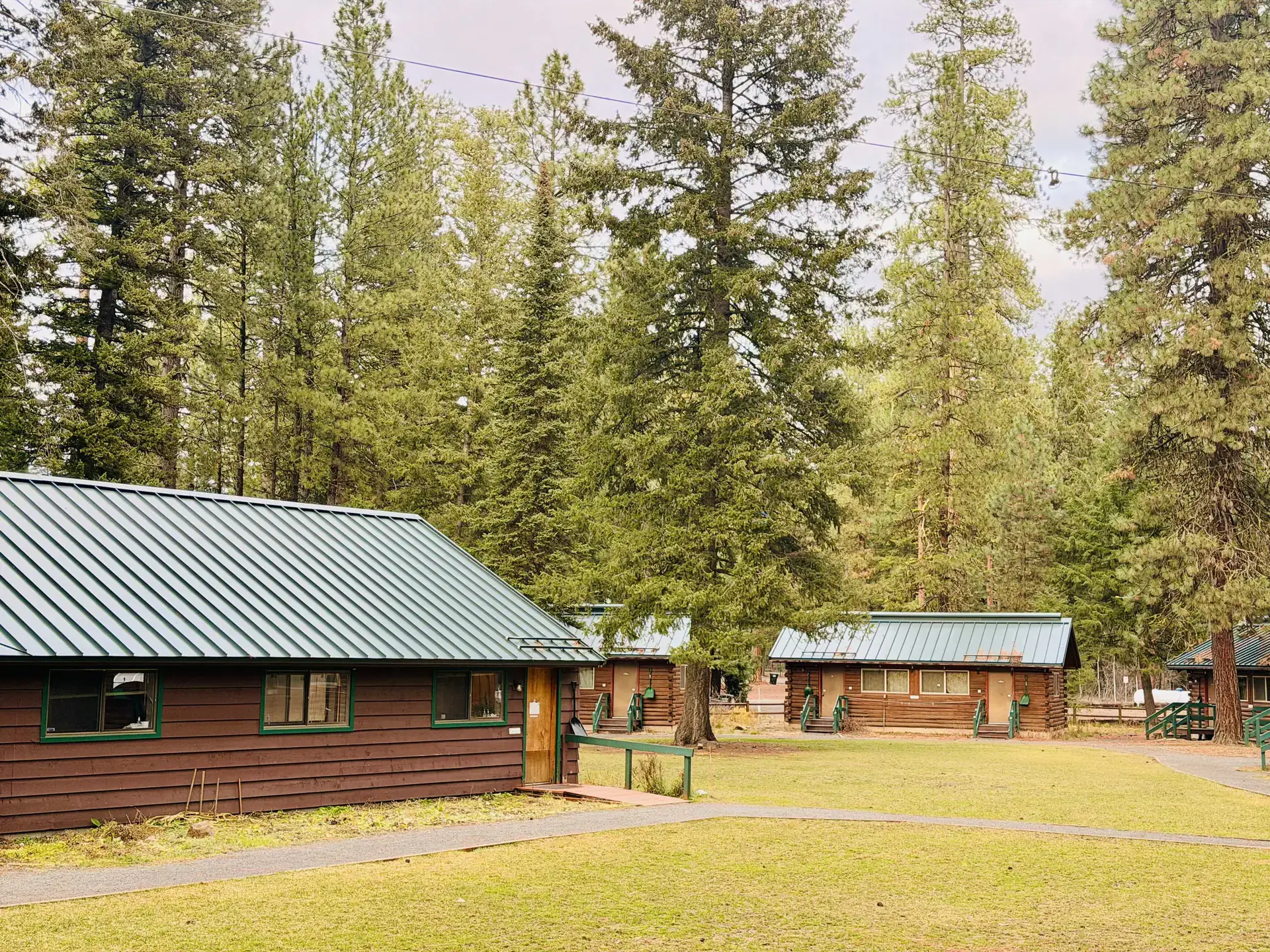 An exterior of a wooden cabin.