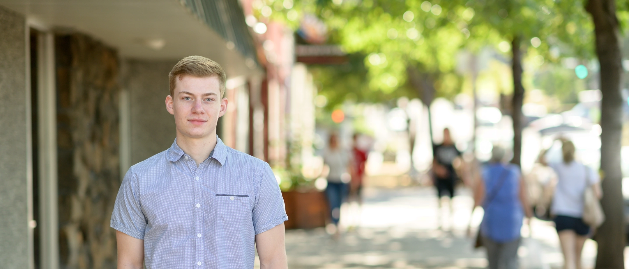 Students and community members gather on Main Street for Moscow Farmer's Market summer 2019