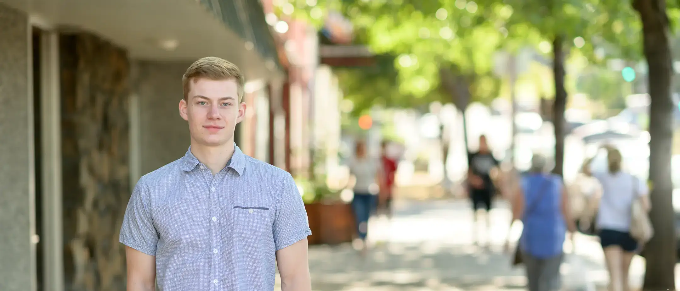 Students and community members gather on Main Street for Moscow Farmer's Market summer 2019