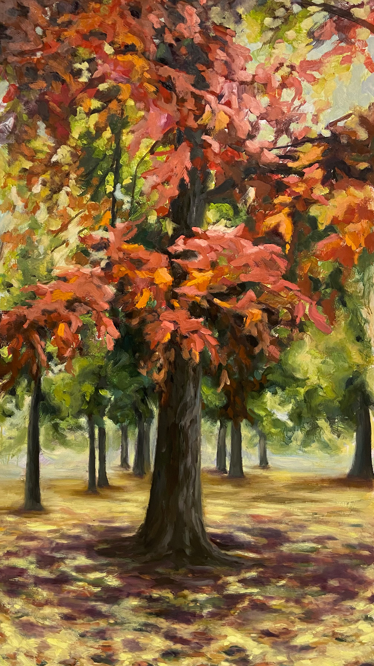 Painting of trees with red leaves in front and green in back.