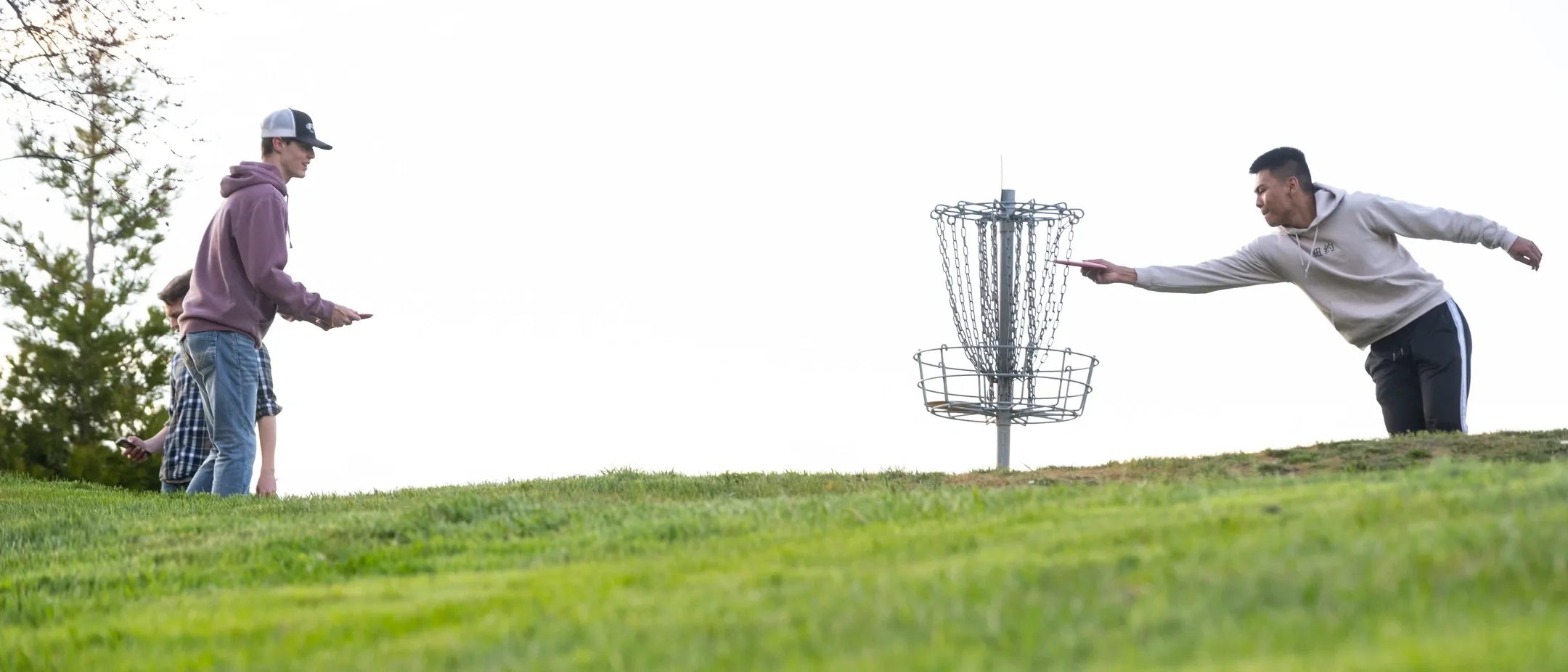 Students playing disc golf at the University of Idaho