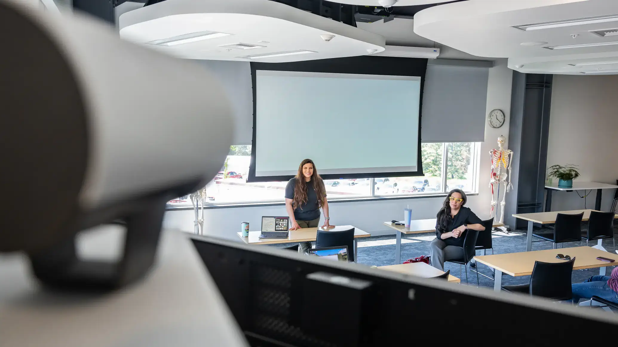 WWAMI Medical Education Program \action shots\ of people interfacing with technology to illustrate the virtual education component of our ECHO Idaho program.