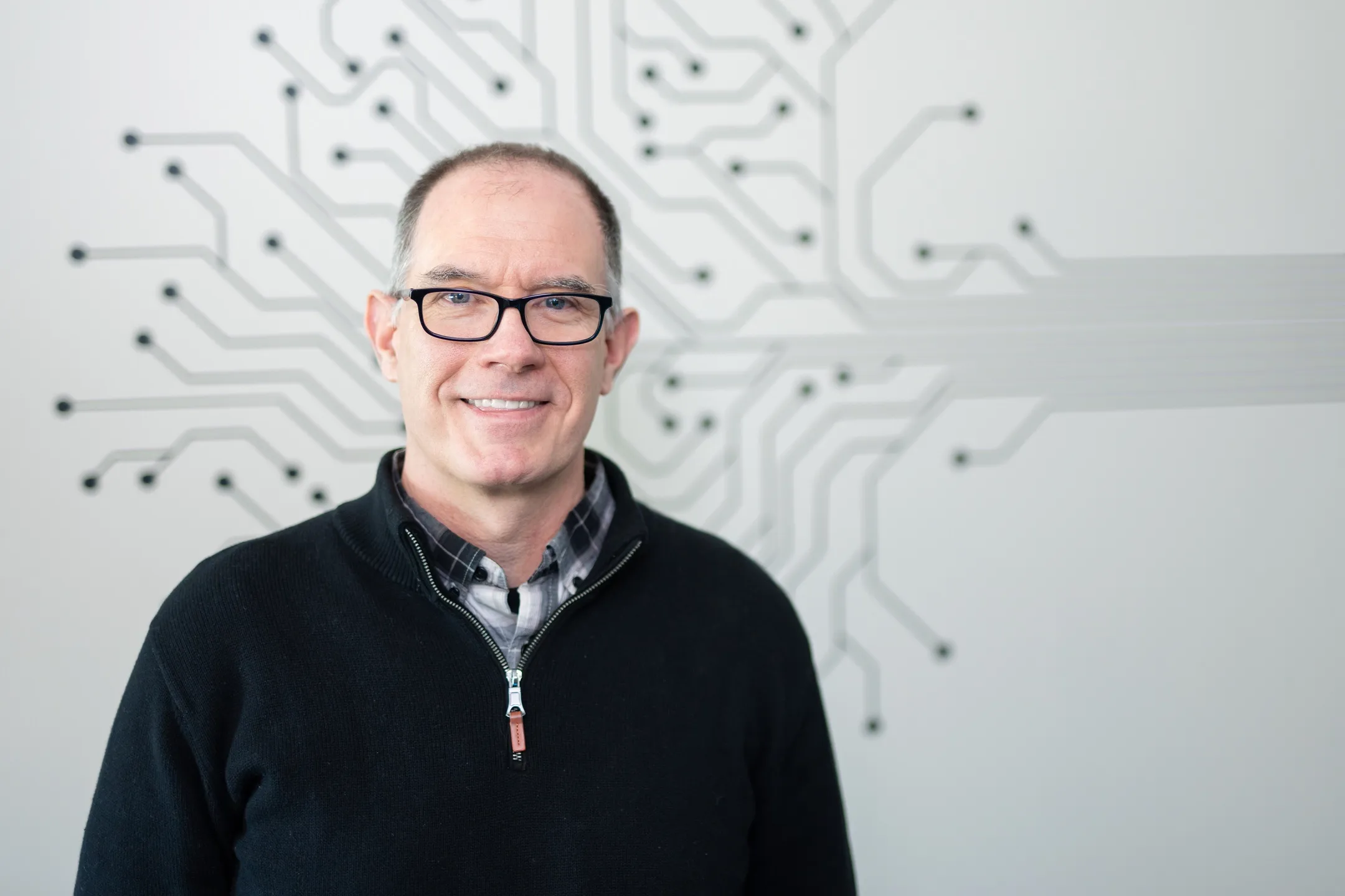 Luke Sheneman, Director of Research Computing and Data Services at the Institute for Interdisciplinary Data Sciences