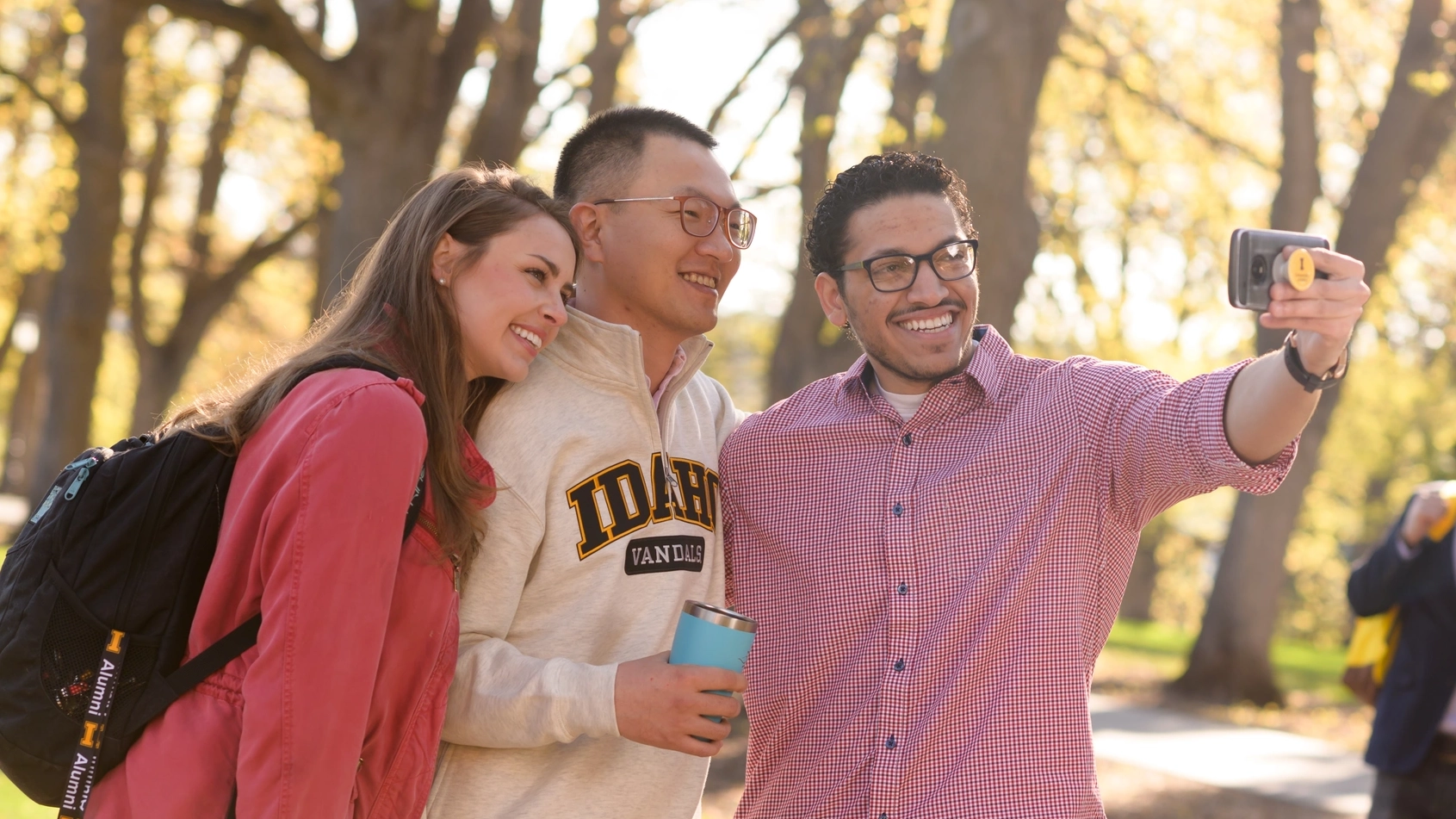 International students on Hello Walk and administraion building lawn socializing
