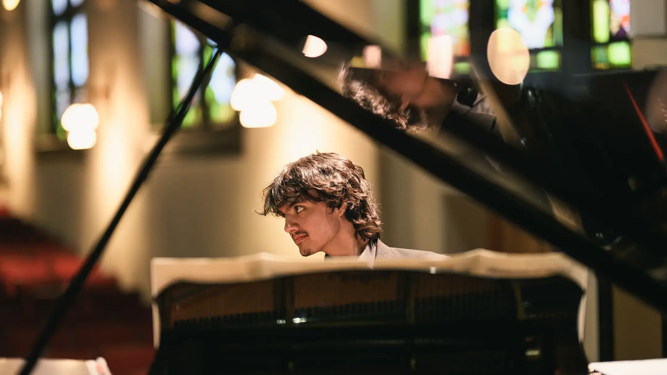 LHSOM Student playing piano