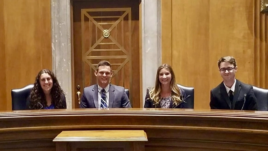 Vandal students sitting in a Senate room