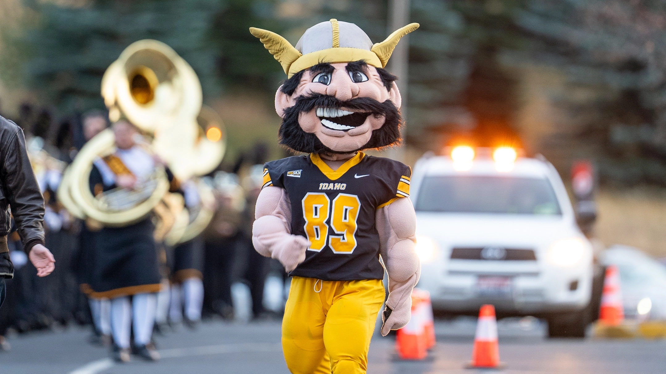Photos of students, fans, alumni, and players at the UIdaho vs. Weber State game in the P1FCU-Kibbie Activity Center.