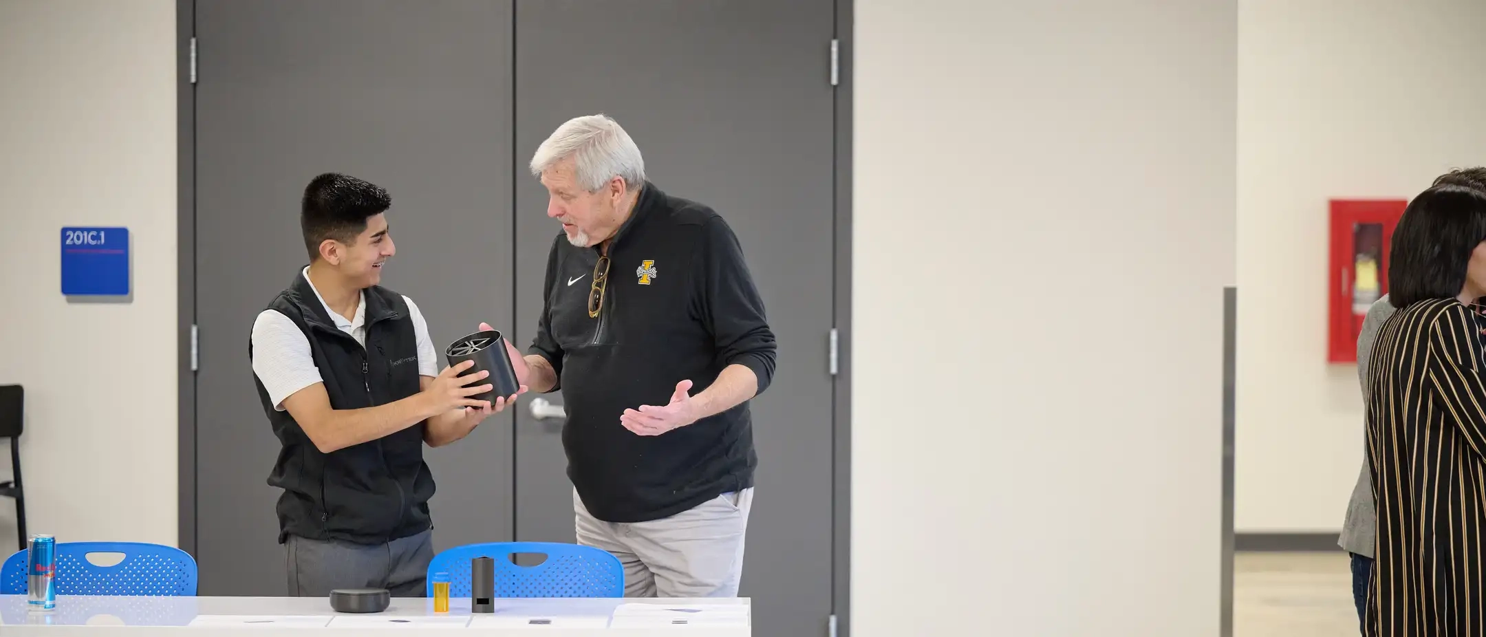 University of Idaho student Ismael Valadez describes the Medi-Mate to attendees of the Idaho Entrepreneur Challenge in Boise on April 3, 2025. He and classmate Austen Reagan have developed the automatic medication dispenser which controls when and how often medications are given.