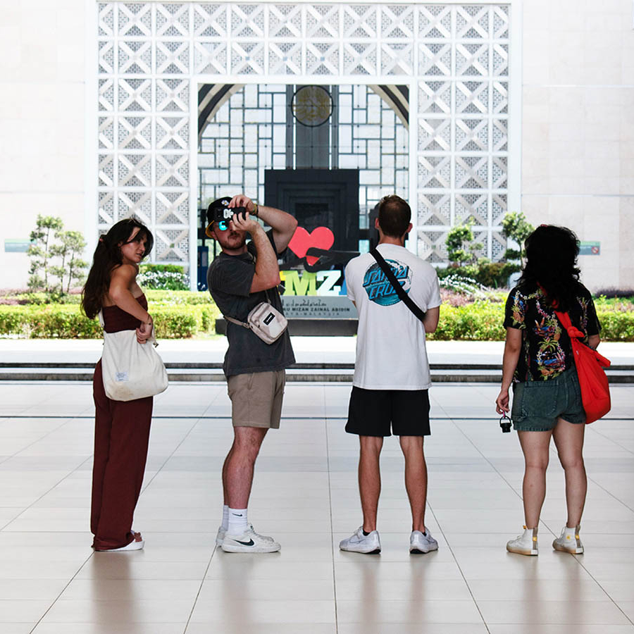 Students taking photos of the  Tuanku Mizan Zainal Abidin Mosque