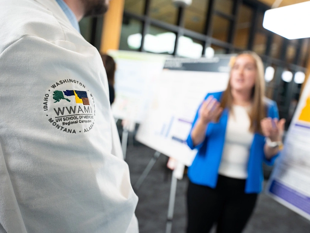 Zoomed in photo of WWAMI white coat logo