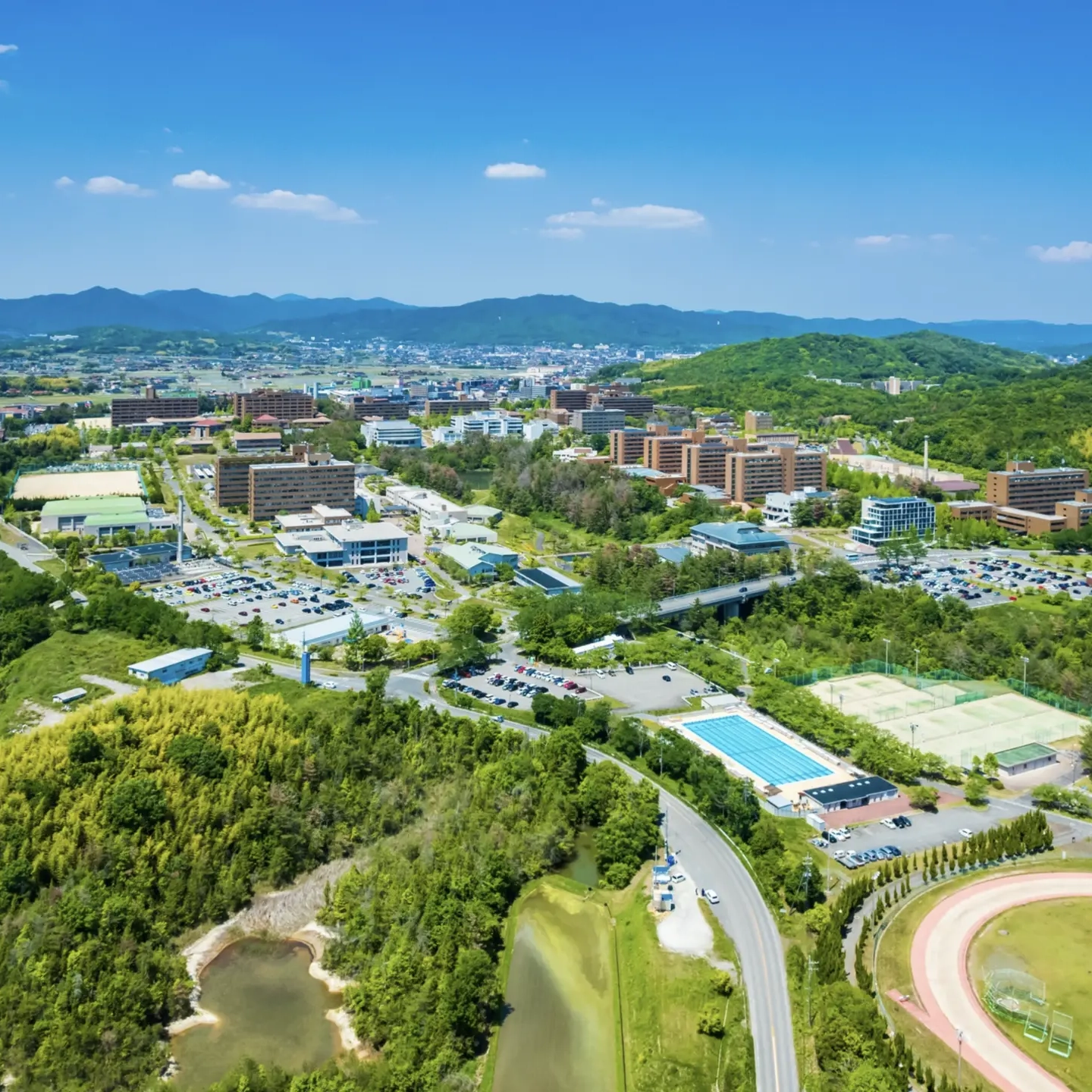 Bird's eye view of Hiroshima University in summer.