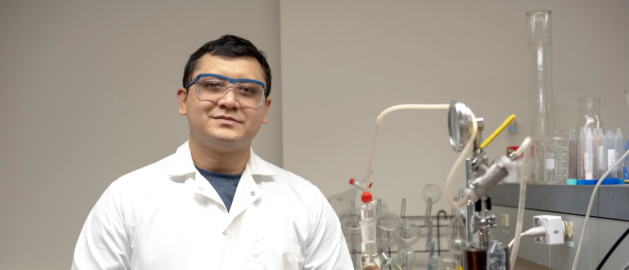University of Idaho College of Agricultural and Life Sciences student Bishal Thapa working on developing a better fertilizer using a plasma reactor.