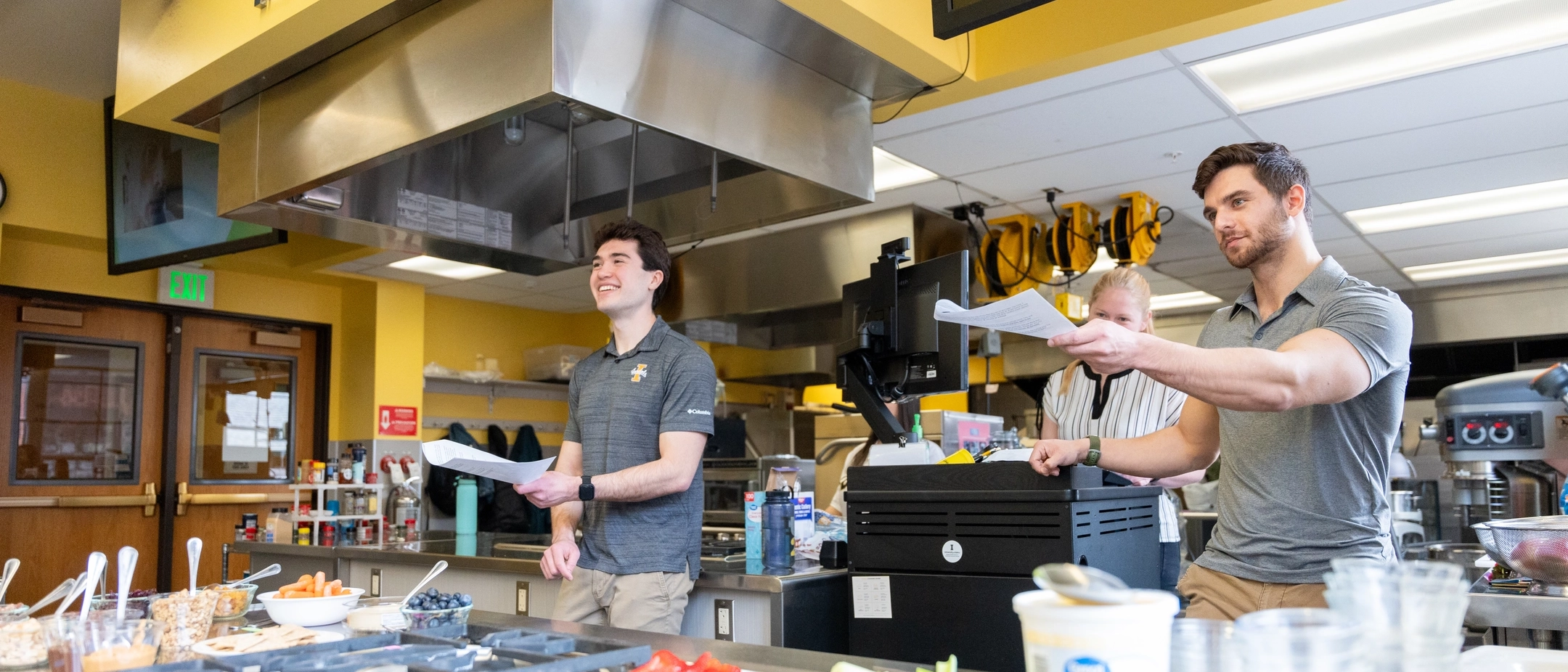 Photos of high schoolers attending an event held at the Niccolls building to showcase what the CALS program has to offer. This field trip included some activities, presentations, tours of the school and interactions with staff and current U of I students.