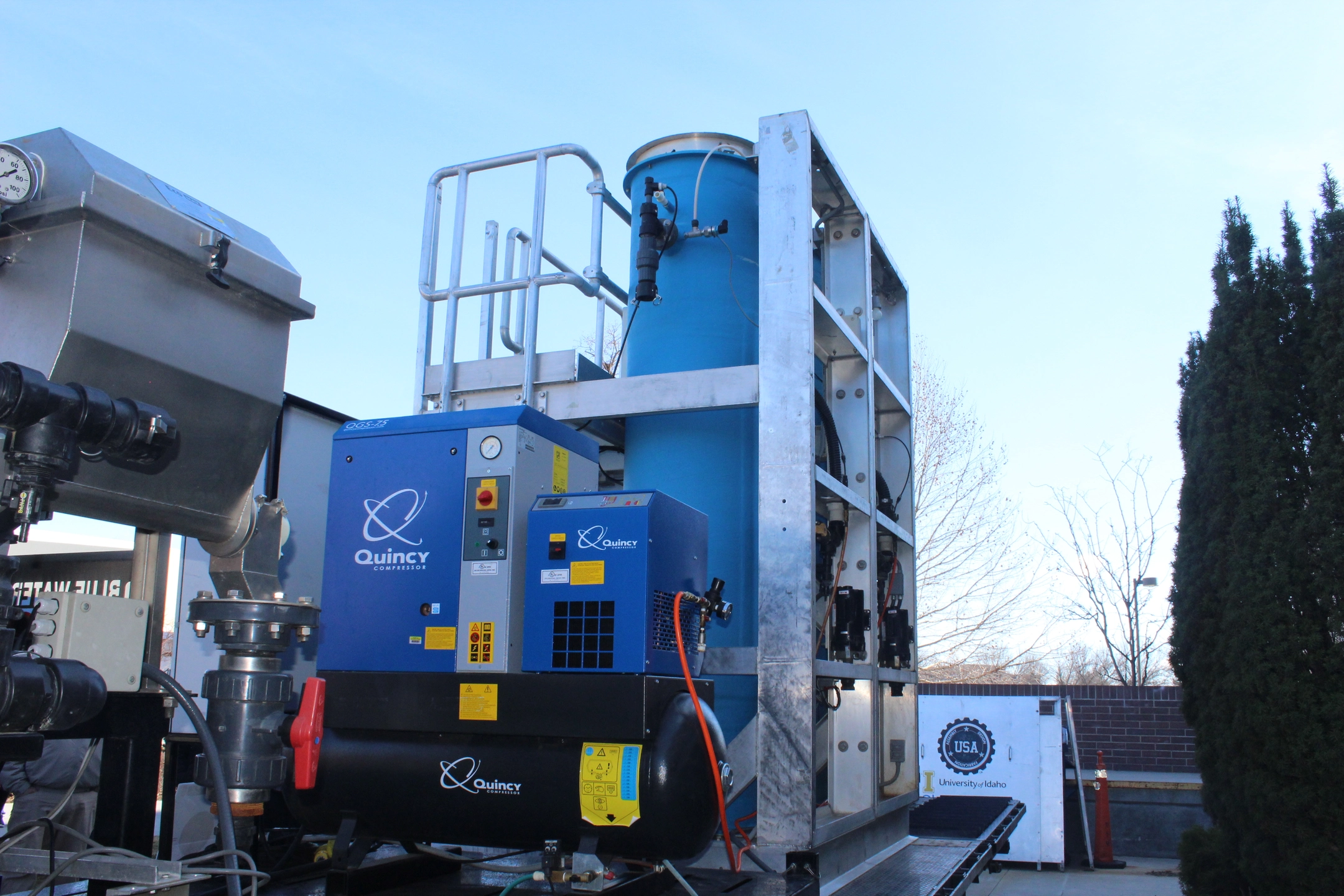 The Clean Water Machine sits in front of a building.