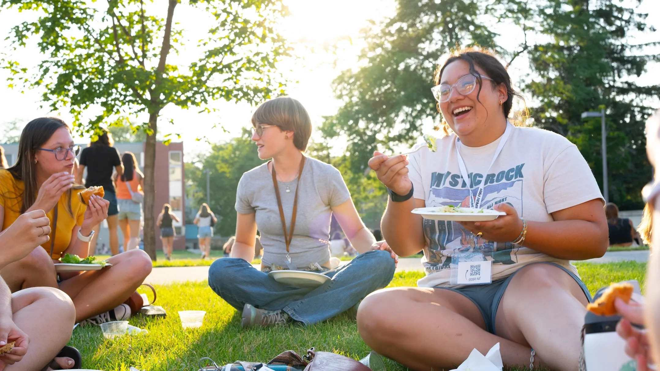 A group of students eating lunch during Week of Welcome