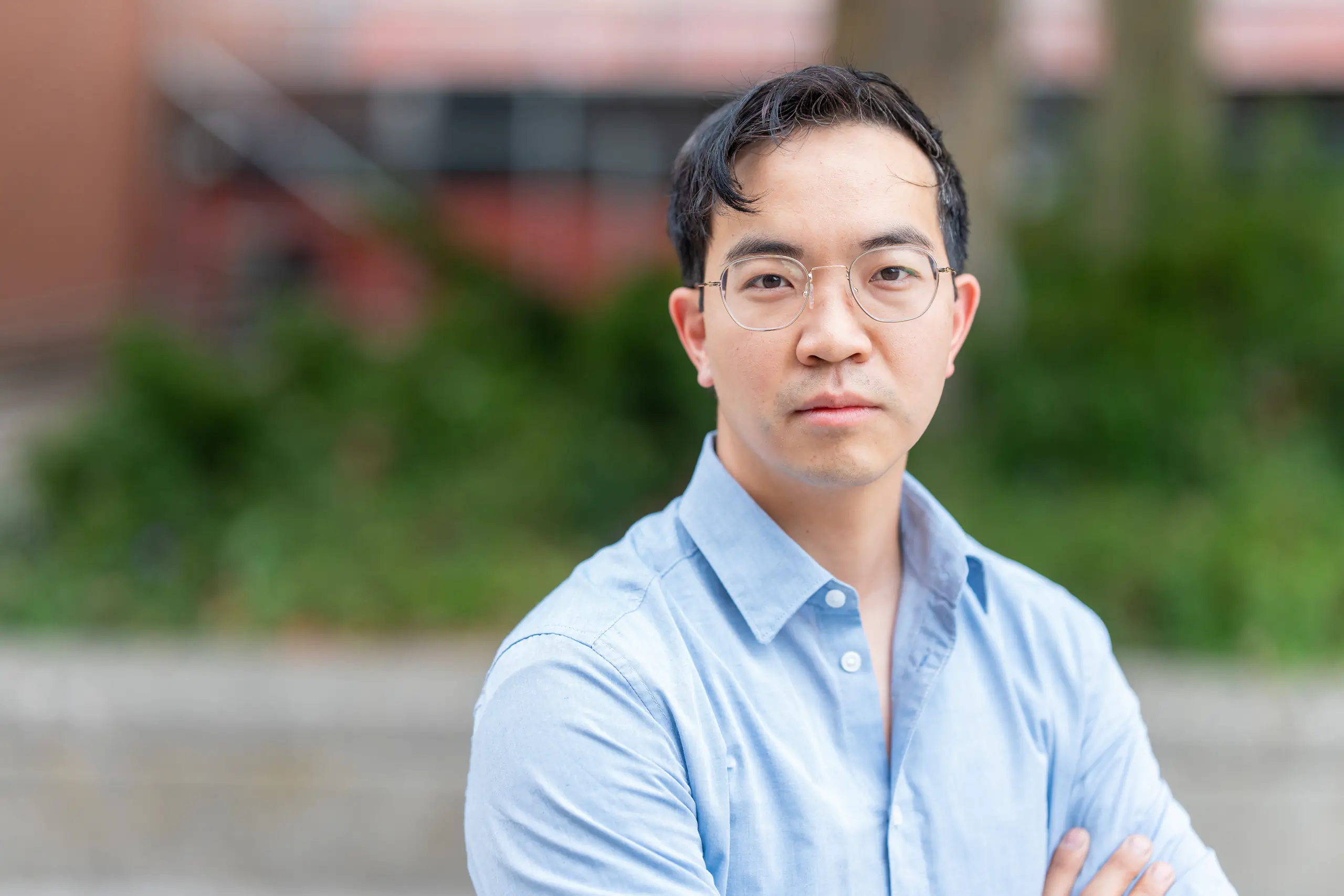 U of I Assistant Professor Colin Xu outdoors on an overcast day