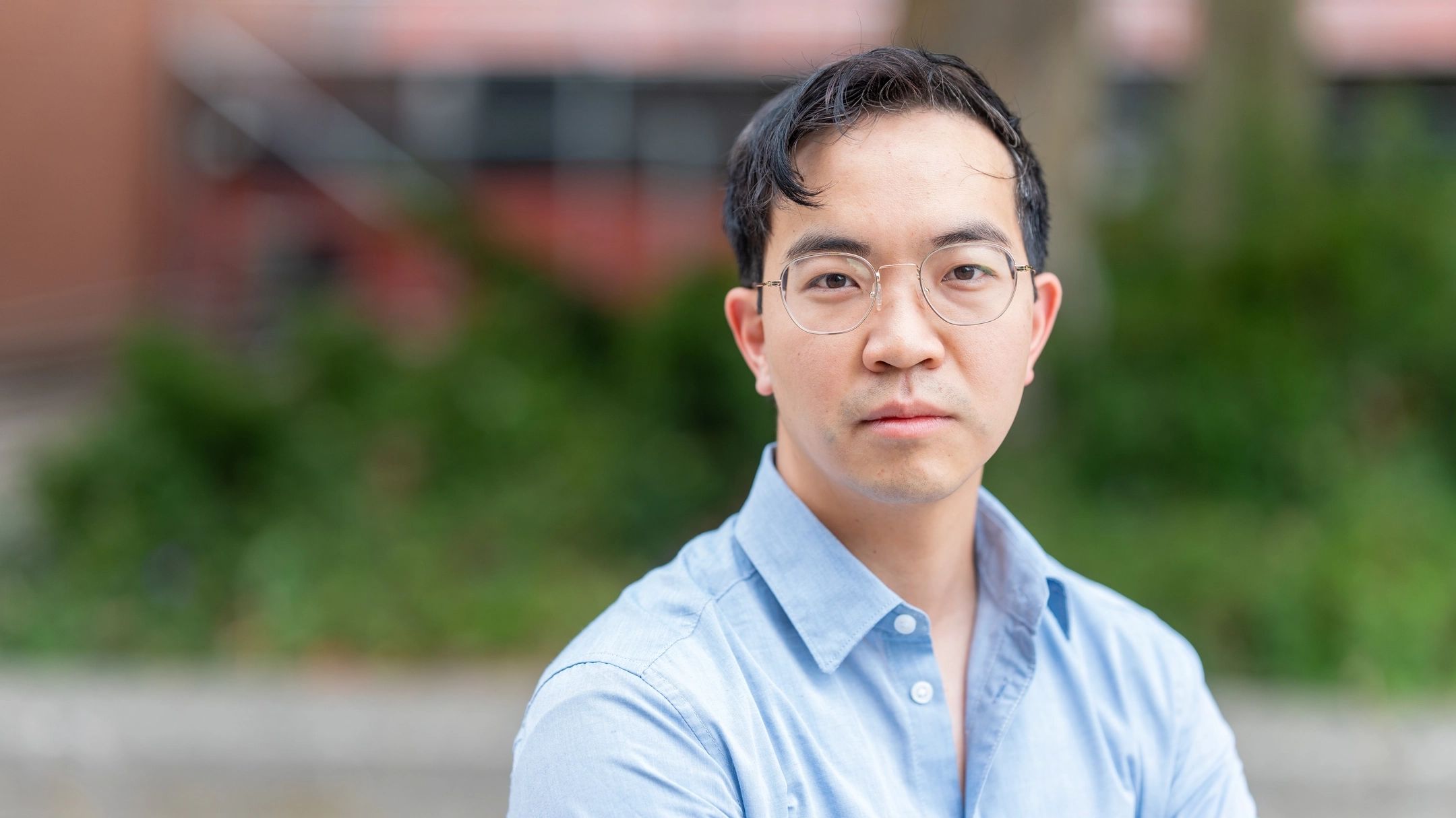 U of I Assistant Professor Colin Xu outdoors on an overcast day