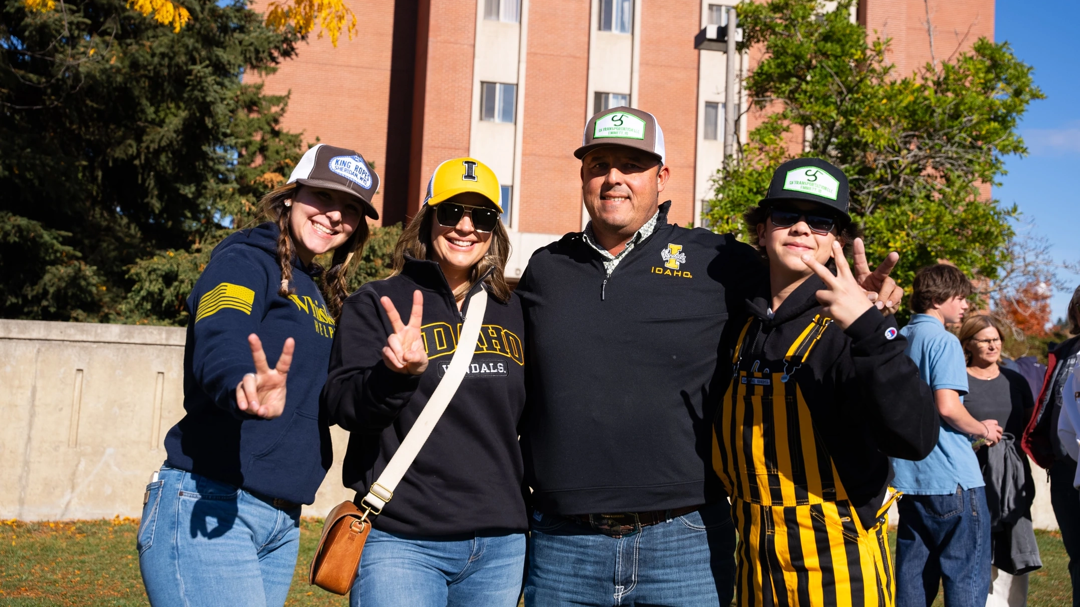 A family of Vandals sporting their Vandal gear.