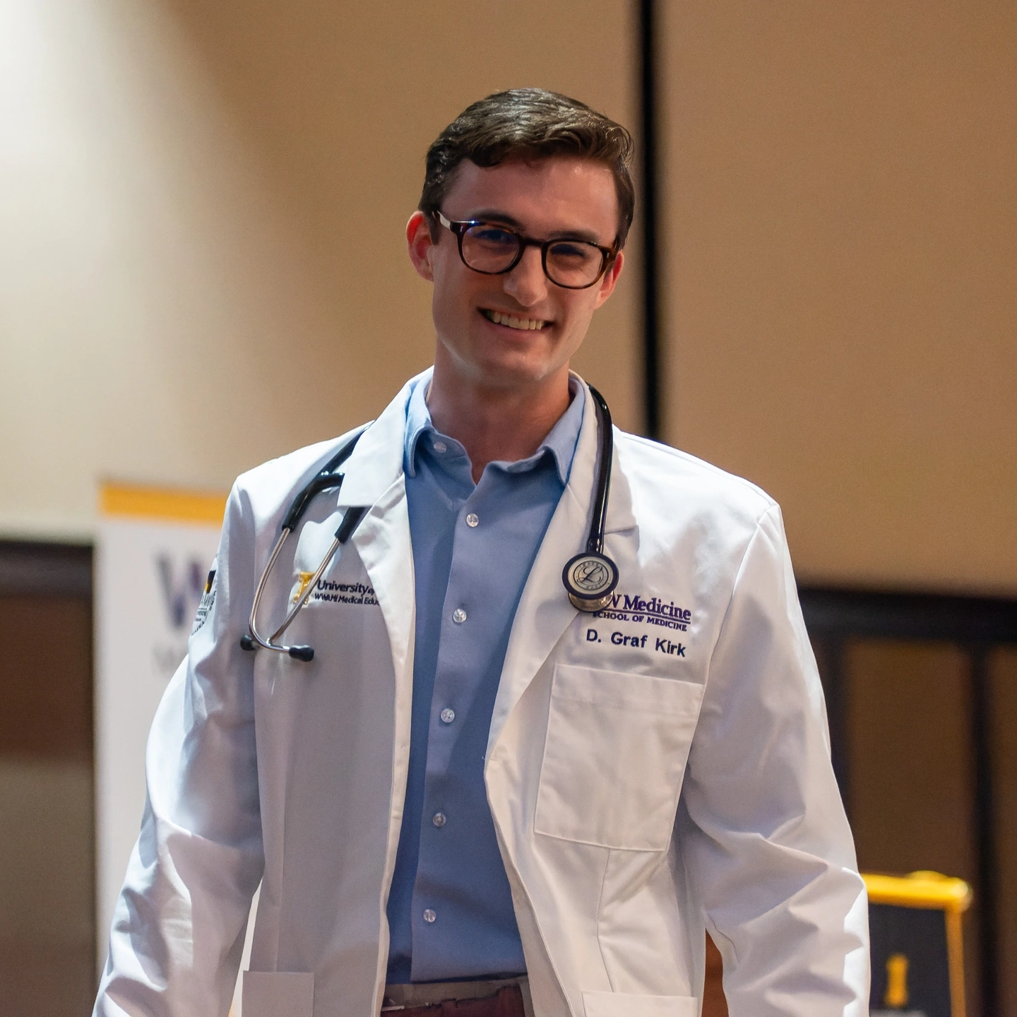 Graf Kirk in lab coat and stethoscope