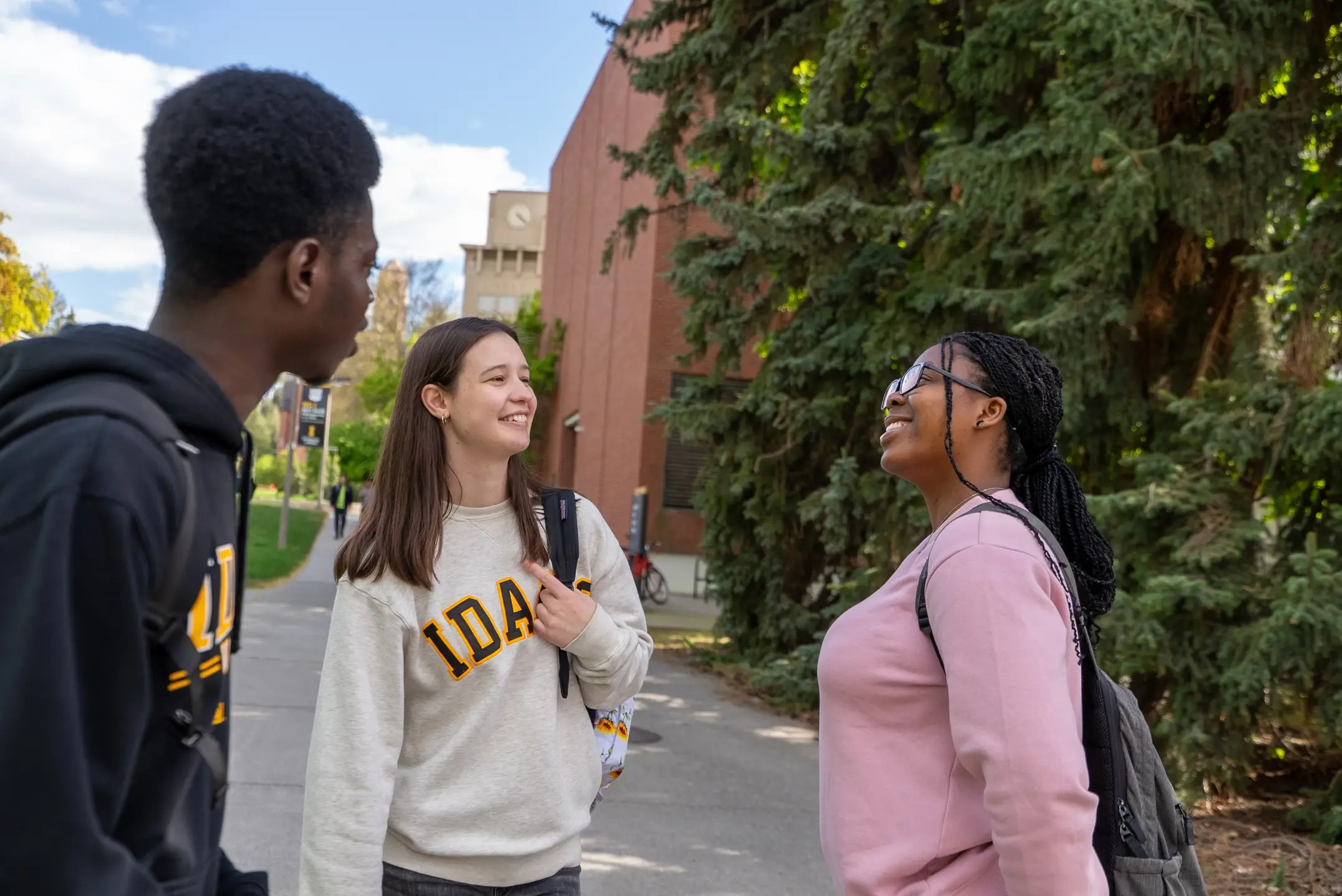 Students gather and socialize along the Academic Mall on Monday, May 5, 2025.