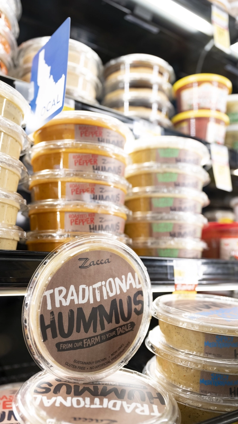 Zacca Hummus in a refrigerator.
