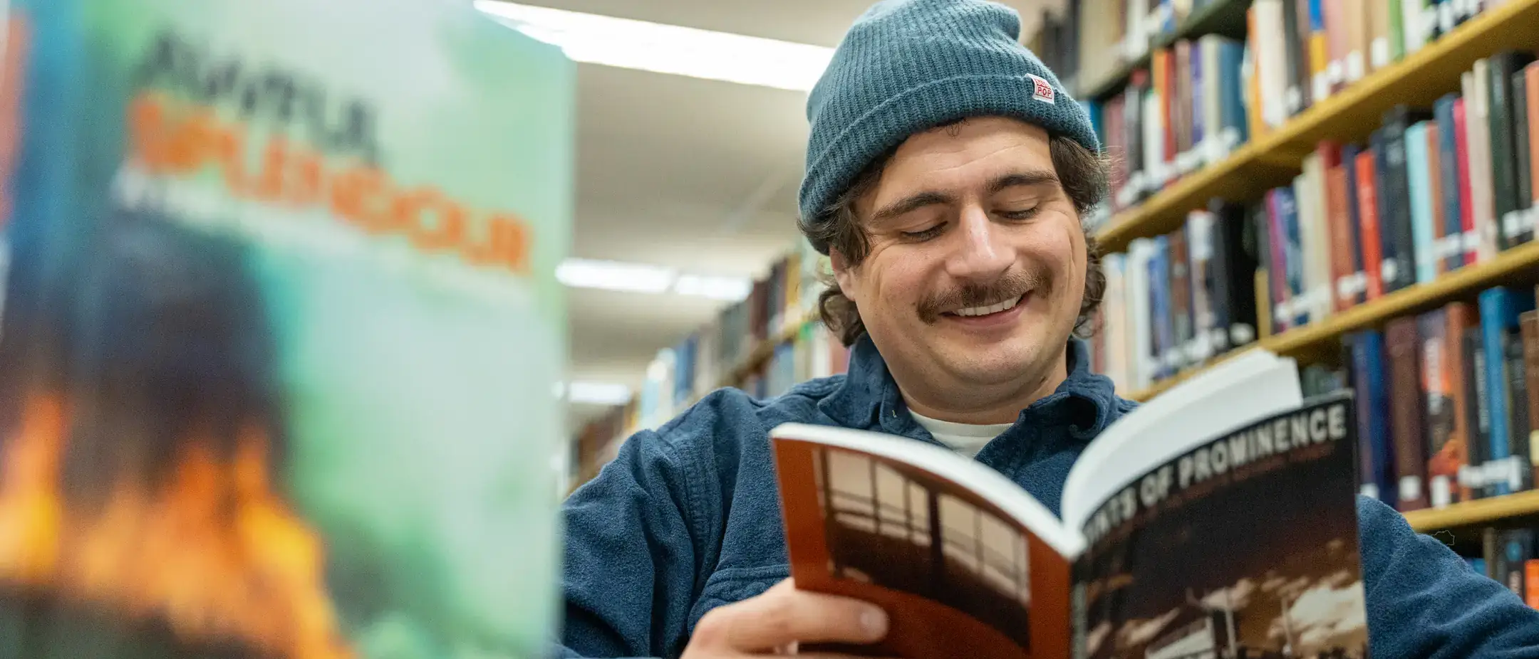 Michael Decker, a grad student, documenting the rich history of fire lookouts in the American West in the Library archives.