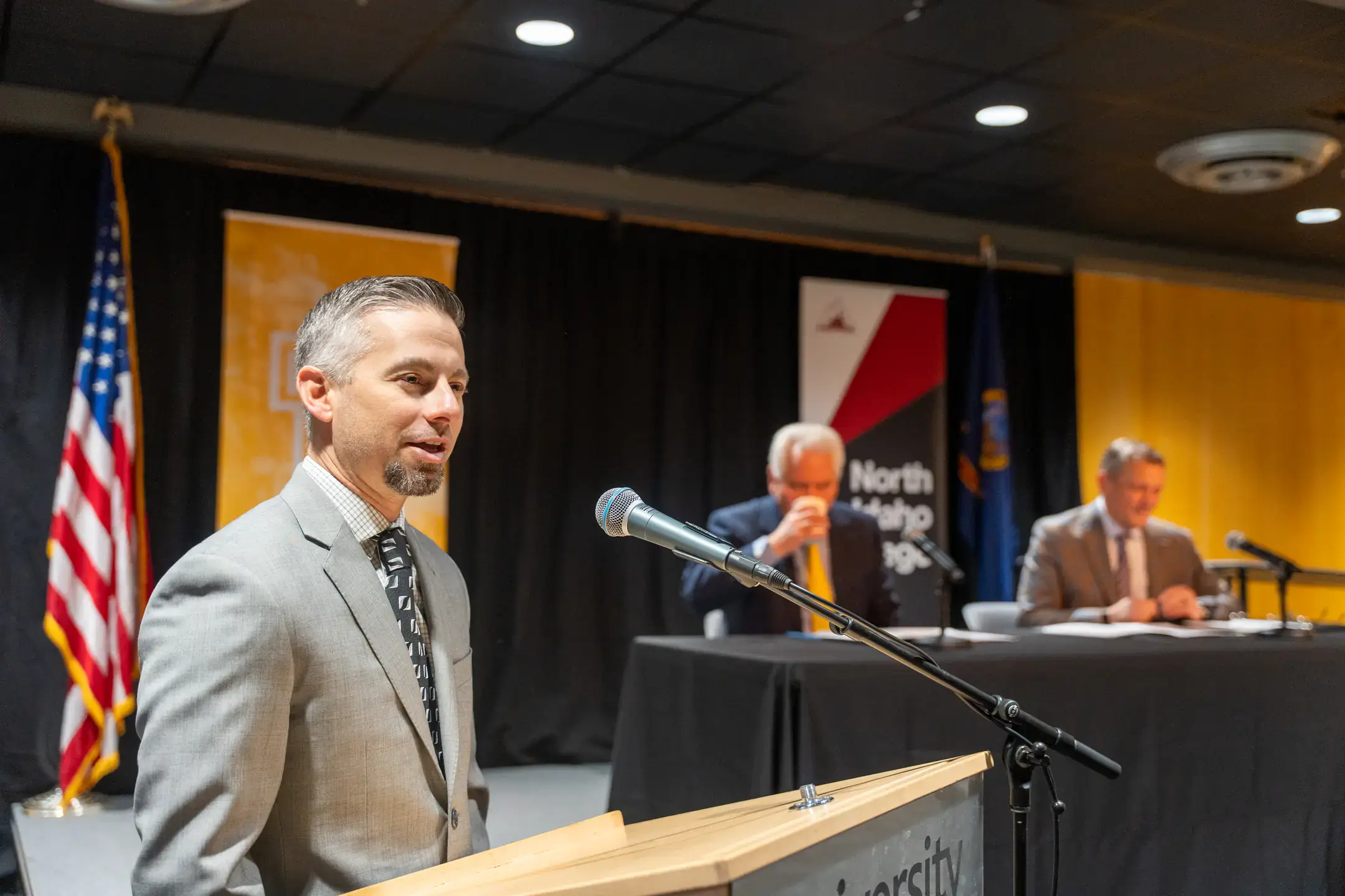 University of Idaho President Scott Green and North Idaho College President Nick Swayne sign a memorandum of understanding (MOU), for the direct entry masters of nursing program, on Wednesday, April 15, 2026 in the Vandal Ballroom at the University of Idaho’s Pitman Center. Pictured from left are: Russell “Rusty” Baker, interim co-Director of University of Idaho School of Health and Medical Professions (SHAMP); U of I President Scott Green; NIC President Nick Swayne.