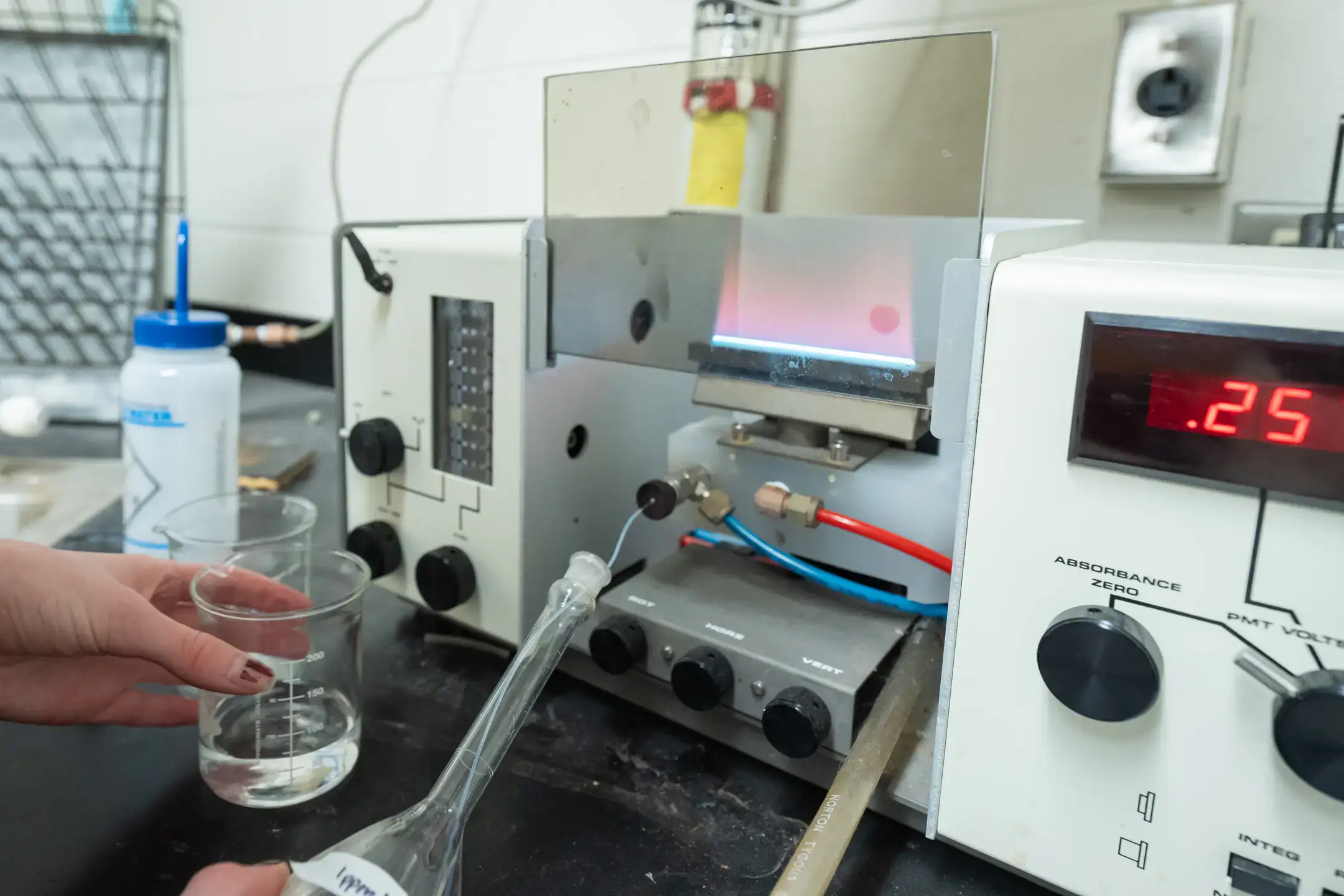 Maddie Moody works with a Scientific Atomic absorption spectrophotometer in Dr. Wandruszka's Lab in Renfrew Hall on the University of Idaho campus.