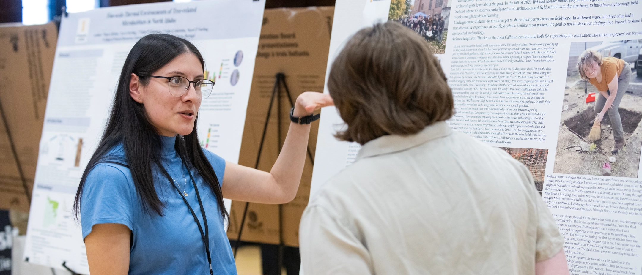 Students presenting about their research at the Office of Undergraduate Research Symposium.