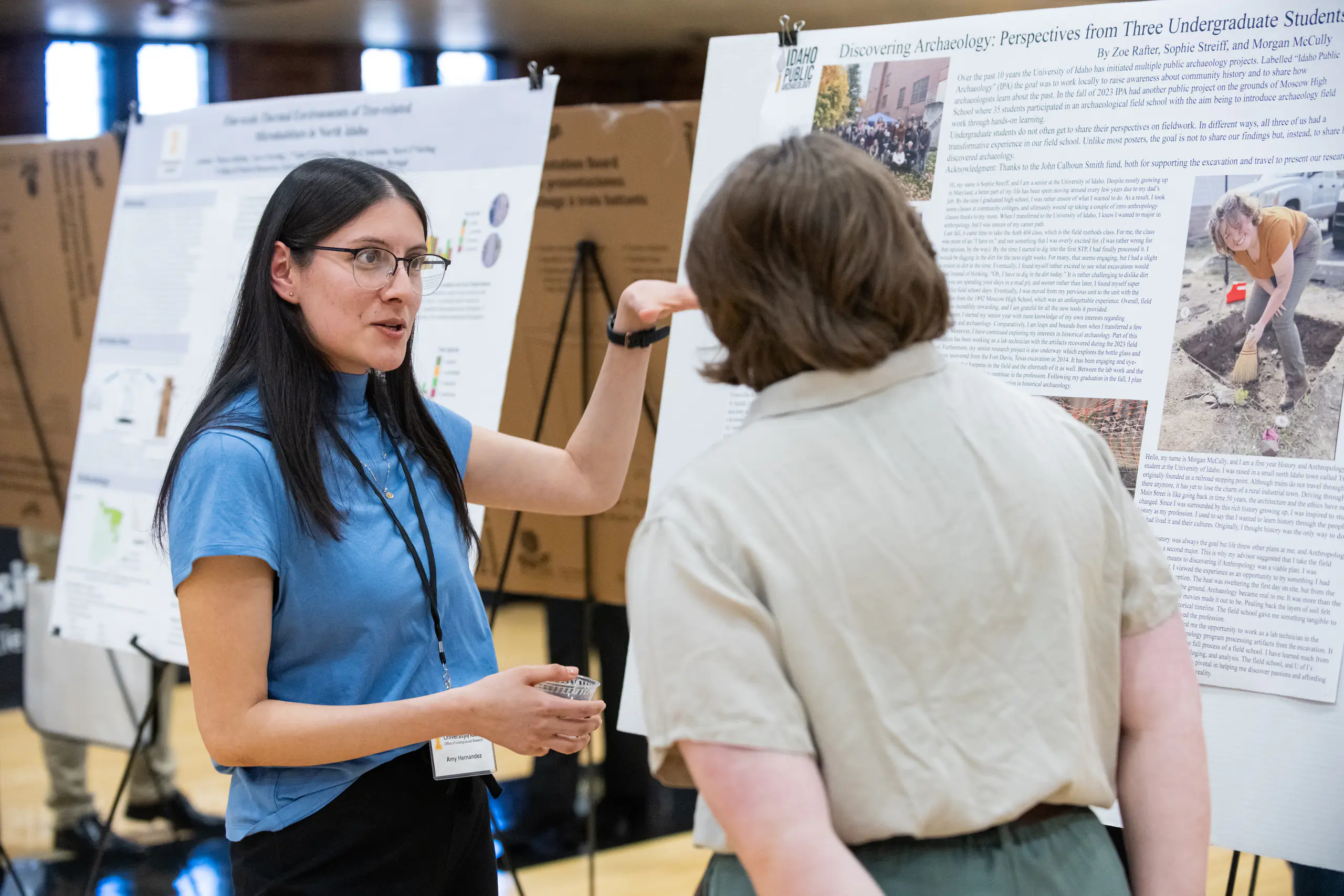 Students presenting about their research at the Office of Undergraduate Research Symposium.