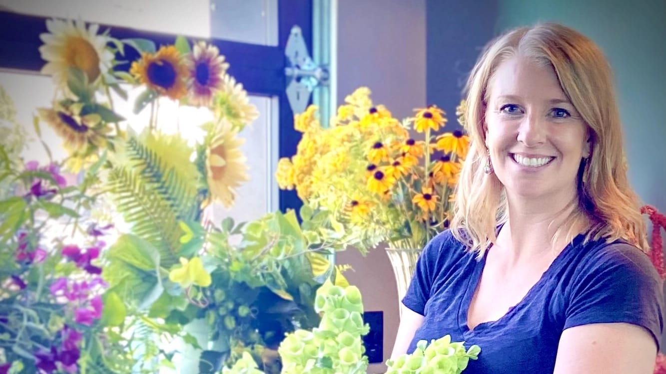Adele Smith of Flowersmith Gardens in Boise holds a bouquet she raised