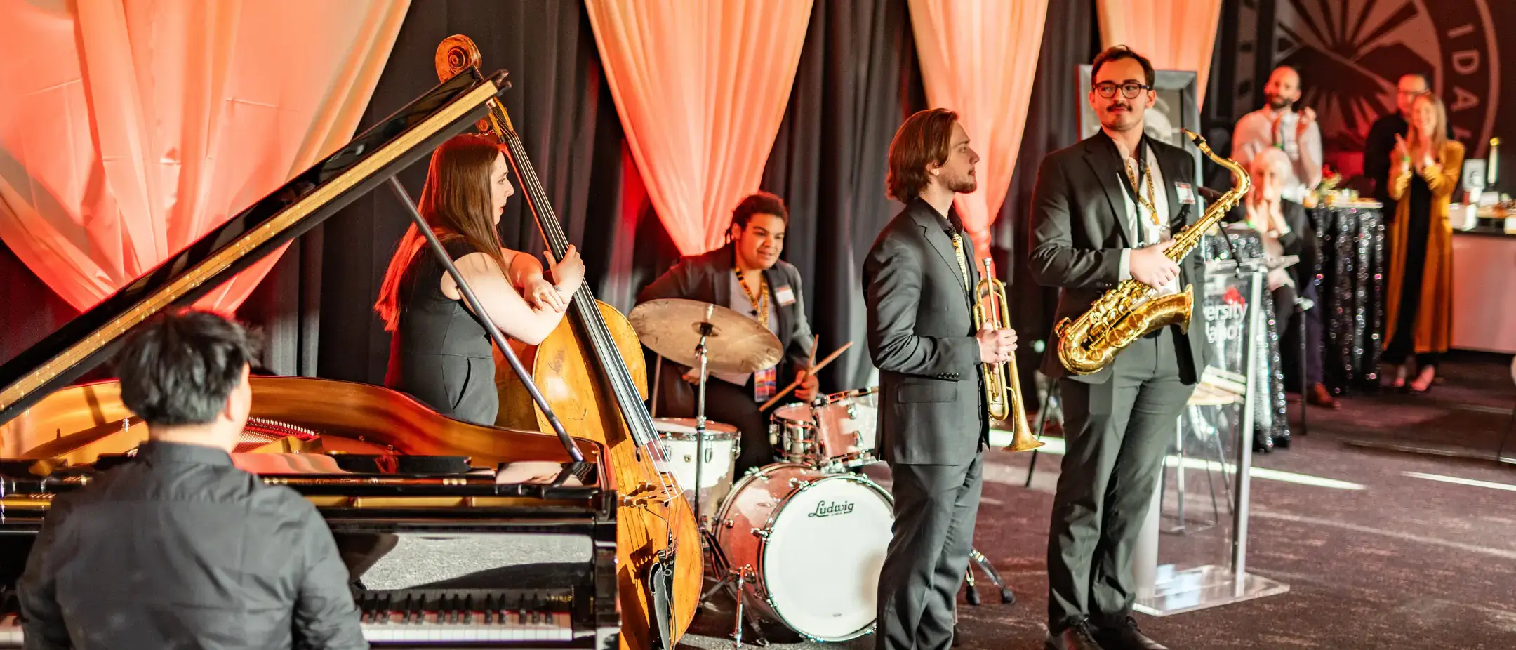 Lionel Hampton Jazz Festival Red Carnation Invitation event 2025. The Red Carnation Dinner is held at the ICCU Arena Friday, April 18, 2025 in Moscow, ID.